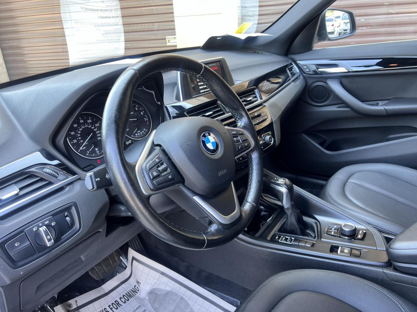 2018 Silver Metallic /Black BMW X1 sDrive28i (WBXHU7C34J5) with an 2.0L L4 DOHC 16V engine, 8A transmission, located at 30 S. Berkeley Avenue, Pasadena, CA, 91107, (626) 248-7567, 34.145447, -118.109398 - 2018 BMW X1 xDrive28i – Luxury, Performance, and Affordability in One SUV VIN: WBXHU7C34J5H42594 Location: Crown City Motors, Pasadena, CA Status: Available Now – Clean Title – Financing Options for All Credit Types Looking for a luxury crossover SUV that combines sporty performance, ele - Photo#21