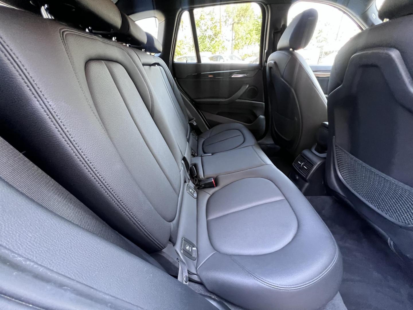 2018 Silver Metallic /Black BMW X1 sDrive28i (WBXHU7C34J5) with an 2.0L L4 DOHC 16V engine, 8A transmission, located at 30 S. Berkeley Avenue, Pasadena, CA, 91107, (626) 248-7567, 34.145447, -118.109398 - 2018 BMW X1 xDrive28i – Luxury, Performance, and Affordability in One SUV VIN: WBXHU7C34J5H42594 Location: Crown City Motors, Pasadena, CA Status: Available Now – Clean Title – Financing Options for All Credit Types Looking for a luxury crossover SUV that combines sporty performance, ele - Photo#23