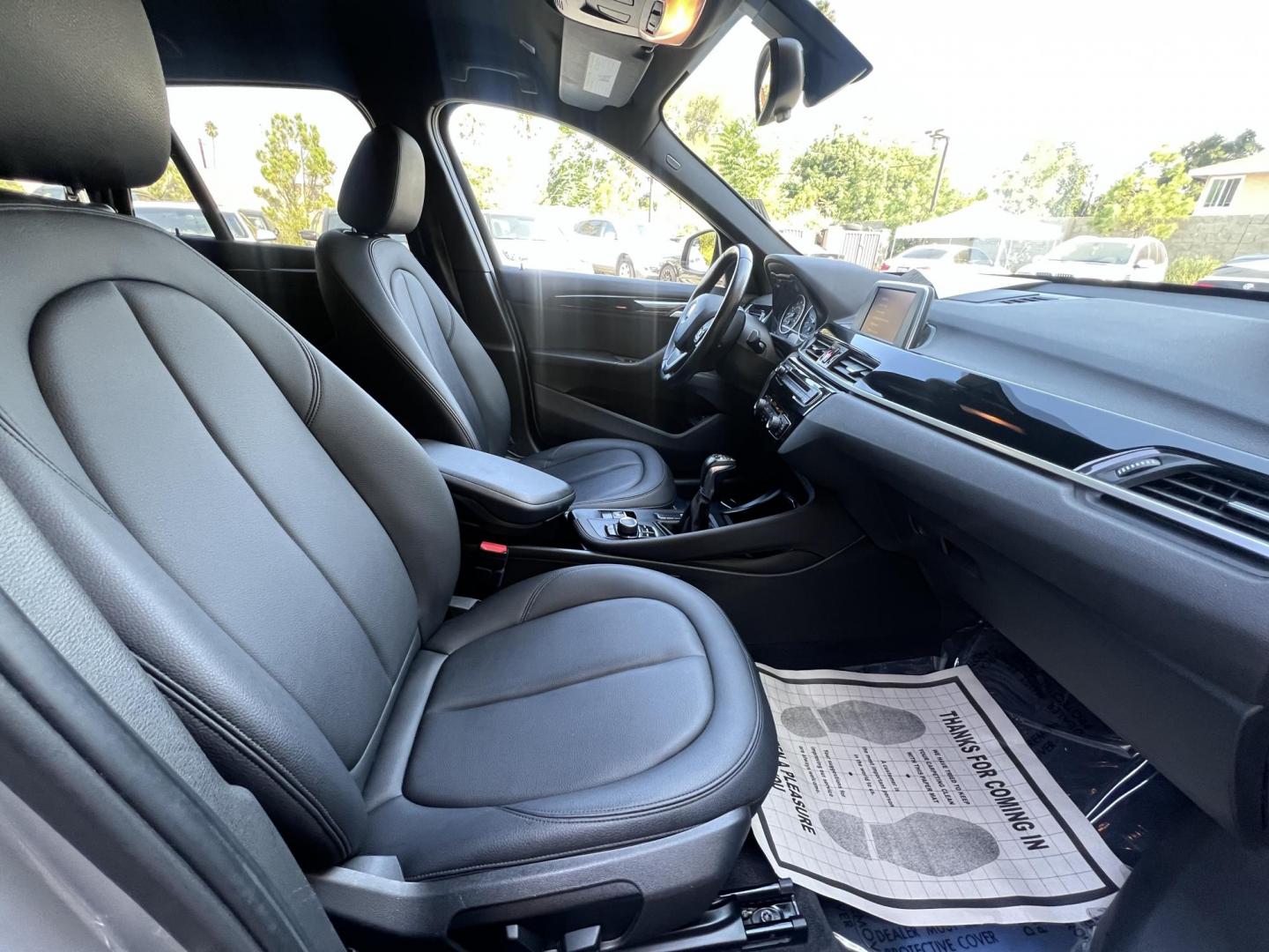 2018 Silver Metallic /Black BMW X1 sDrive28i (WBXHU7C34J5) with an 2.0L L4 DOHC 16V engine, 8A transmission, located at 30 S. Berkeley Avenue, Pasadena, CA, 91107, (626) 248-7567, 34.145447, -118.109398 - 2018 BMW X1 xDrive28i – Luxury, Performance, and Affordability in One SUV VIN: WBXHU7C34J5H42594 Location: Crown City Motors, Pasadena, CA Status: Available Now – Clean Title – Financing Options for All Credit Types Looking for a luxury crossover SUV that combines sporty performance, ele - Photo#25