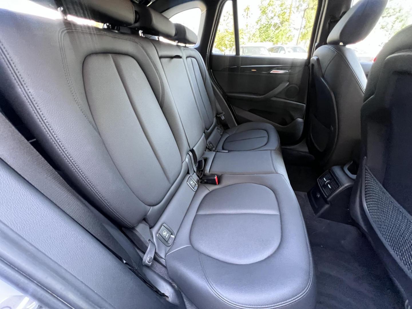 2018 Silver Metallic /Black BMW X1 sDrive28i (WBXHU7C34J5) with an 2.0L L4 DOHC 16V engine, 8A transmission, located at 30 S. Berkeley Avenue, Pasadena, CA, 91107, (626) 248-7567, 34.145447, -118.109398 - 2018 BMW X1 xDrive28i – Luxury, Performance, and Affordability in One SUV VIN: WBXHU7C34J5H42594 Location: Crown City Motors, Pasadena, CA Status: Available Now – Clean Title – Financing Options for All Credit Types Looking for a luxury crossover SUV that combines sporty performance, ele - Photo#32