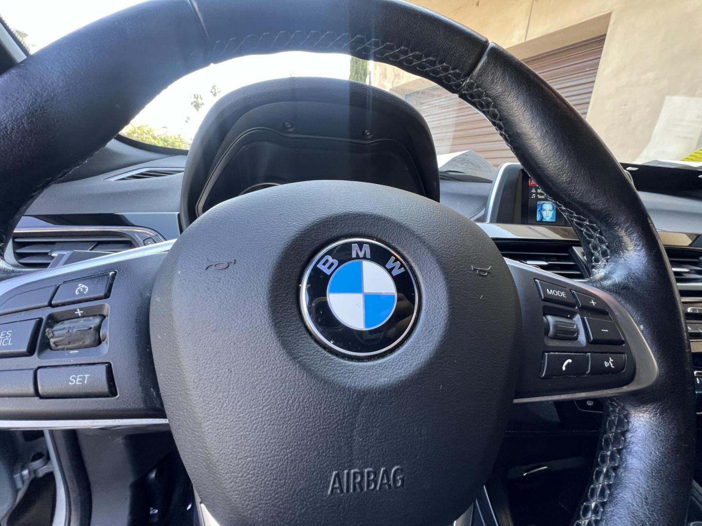 2018 Silver Metallic /Black BMW X1 sDrive28i (WBXHU7C34J5) with an 2.0L L4 DOHC 16V engine, 8A transmission, located at 30 S. Berkeley Avenue, Pasadena, CA, 91107, (626) 248-7567, 34.145447, -118.109398 - 2018 BMW X1 xDrive28i – Luxury, Performance, and Affordability in One SUV VIN: WBXHU7C34J5H42594 Location: Crown City Motors, Pasadena, CA Status: Available Now – Clean Title – Financing Options for All Credit Types Looking for a luxury crossover SUV that combines sporty performance, ele - Photo#37