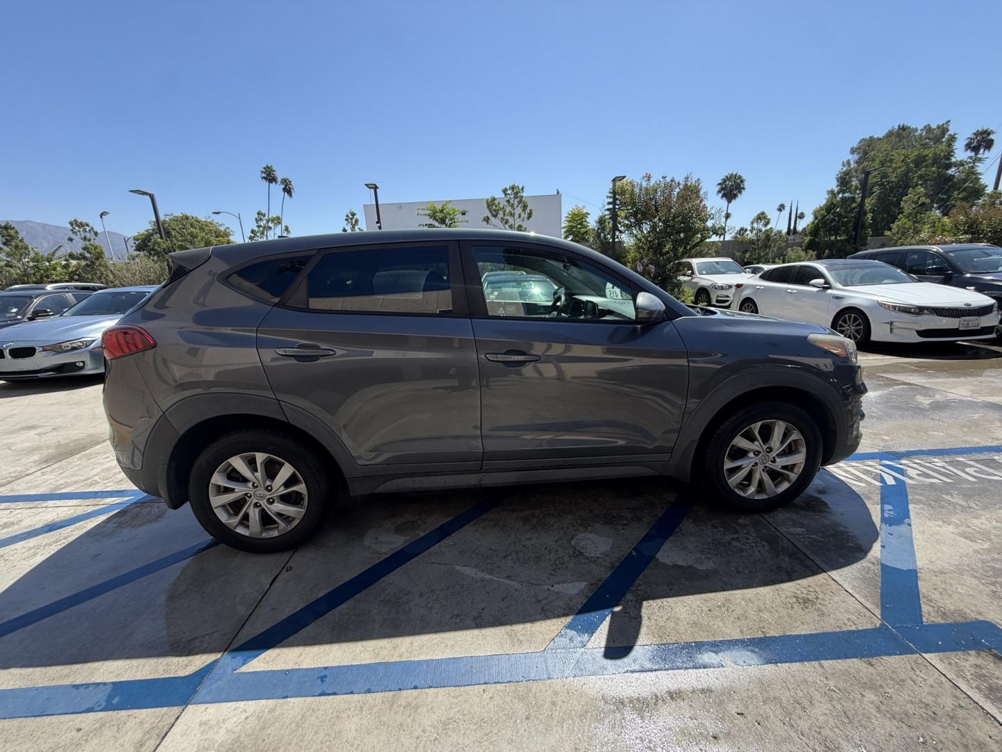 2019 Coliseum Gray /Black Hyundai Tucson SE (KM8J23A48KU) with an 2.0L L4 DOHC 16V engine, 6A transmission, located at 30 S. Berkeley Avenue, Pasadena, CA, 91107, (626) 248-7567, 34.145447, -118.109398 - DEALER IDENTIFIER: Crown City Motors Sales | Buy Here Pay Here Pasadena TARGET REGIONS: Pasadena, San Gabriel Valley, Riverside, San Bernardino FINANCING SPECIALTY: Subprime Auto Lending, In-House Financing, Bad Credit Car Loans CA VEHICLE: 2019 Hyundai Tucson SE 2.0L (VIN: KM8J23A48KU859863)- Photo#5