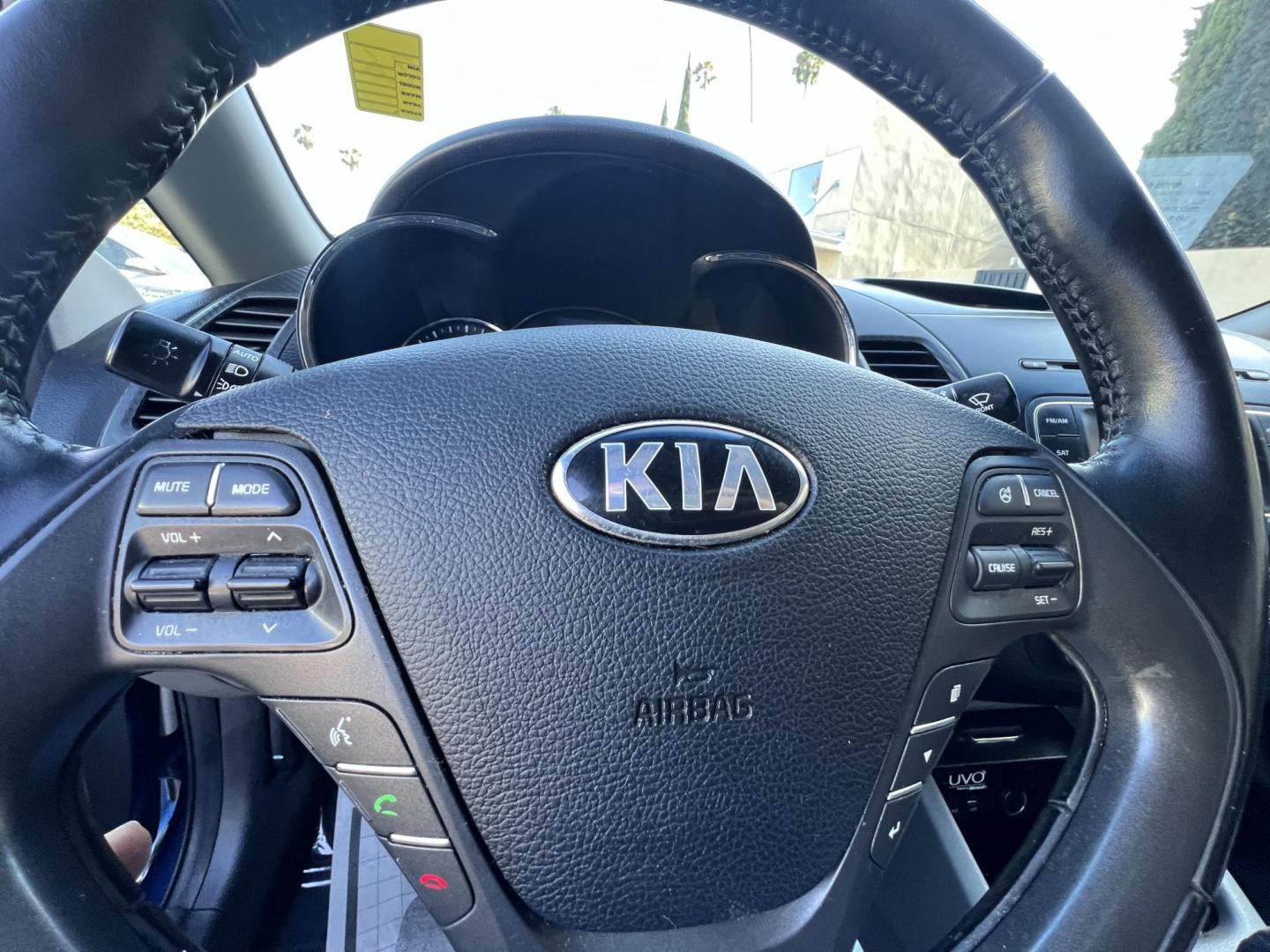 2014 Abyss Blue Pear /Black Kia Forte EX (KNAFX4A82E5) with an 2.0L L4 DOHC 16V engine, 6-Speed Automatic transmission, located at 30 S. Berkeley Avenue, Pasadena, CA, 91107, (626) 248-7567, 34.145447, -118.109398 - ? 2014 Kia Forte EX – Affordable Style and Efficiency with Easy BHPH Financing VIN: KNAFX4A82E5106328 Location: Crown City Motors, Pasadena, CA Financing Options: Buy Here Pay Here | Low Down Payment | Bad Credit OK Looking for a sleek, efficient, and budget-friendly sedan with all the featu - Photo#34