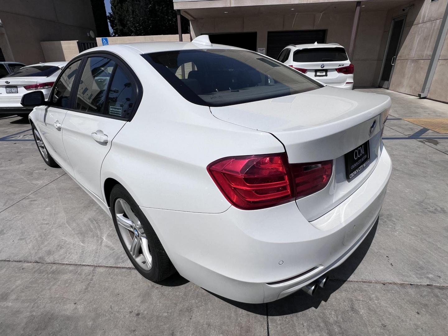 2015 White BMW 3-Series 328i SULEV (WBA3C1C56FK) with an 2.0L L4 DOHC 16V engine, 8-Speed Automatic transmission, located at 30 S. Berkeley Avenue, Pasadena, CA, 91107, (626) 248-7567, 34.145447, -118.109398 - Crown City Motors is a used “Buy Here Pay Here” car dealer in Pasadena CA. “Buy Here Pay Here” financing, means that when you purchase your vehicle from our dealership, that you make the payments to the dealership as well. We do not need the banks approval to get you approved for a used auto - Photo#2