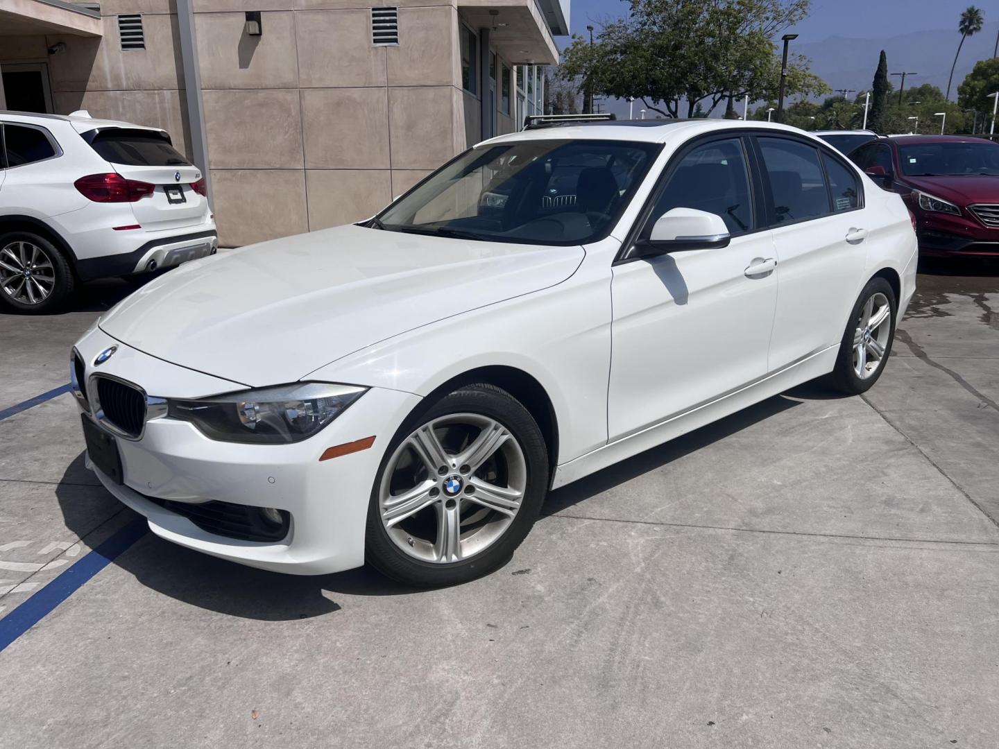 2015 White BMW 3-Series 328i SULEV (WBA3C1C56FK) with an 2.0L L4 DOHC 16V engine, 8-Speed Automatic transmission, located at 30 S. Berkeley Avenue, Pasadena, CA, 91107, (626) 248-7567, 34.145447, -118.109398 - Crown City Motors is a used “Buy Here Pay Here” car dealer in Pasadena CA. “Buy Here Pay Here” financing, means that when you purchase your vehicle from our dealership, that you make the payments to the dealership as well. We do not need the banks approval to get you approved for a used auto - Photo#0