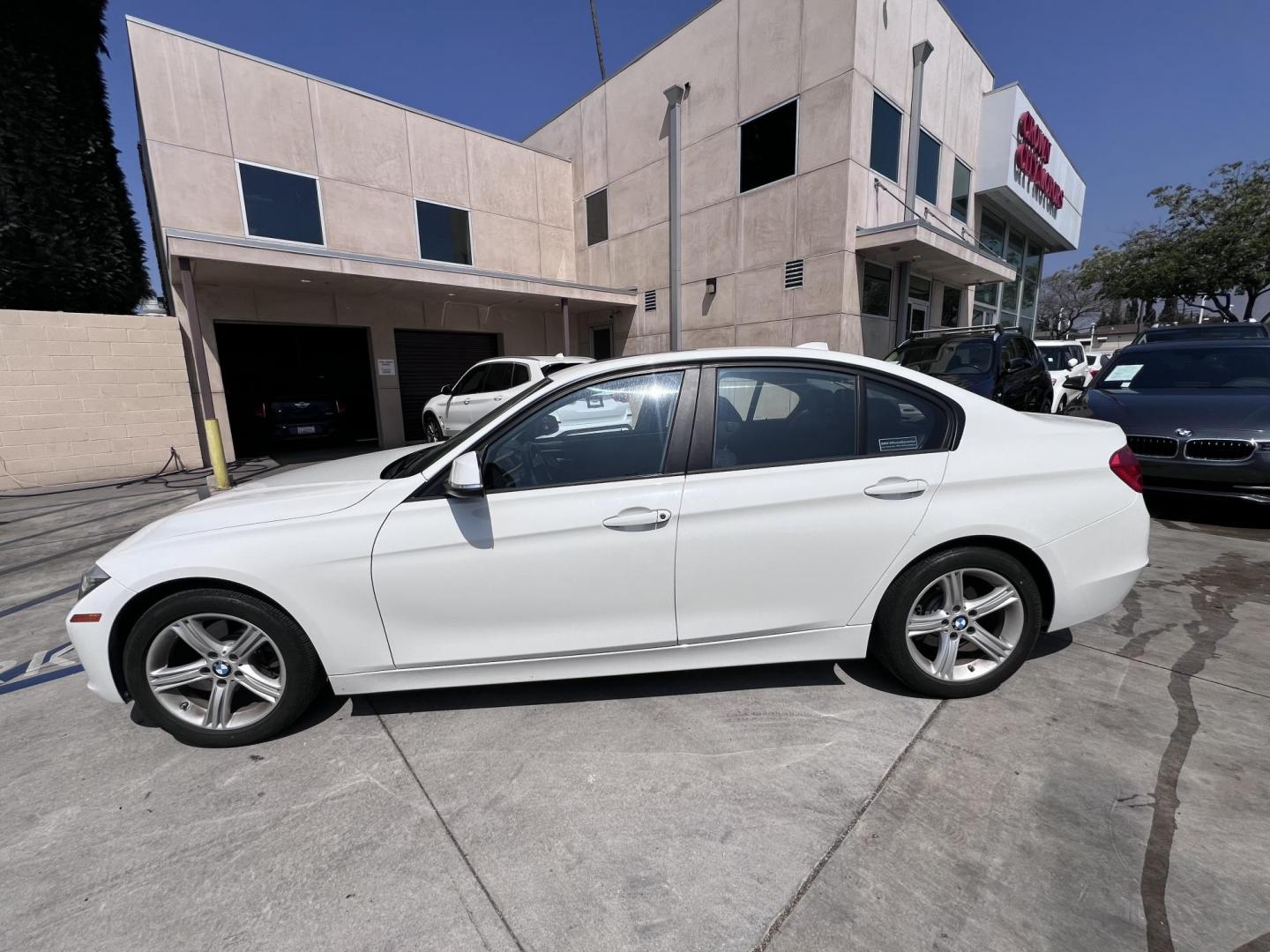 2015 White BMW 3-Series 328i SULEV (WBA3C1C56FK) with an 2.0L L4 DOHC 16V engine, 8-Speed Automatic transmission, located at 30 S. Berkeley Avenue, Pasadena, CA, 91107, (626) 248-7567, 34.145447, -118.109398 - Crown City Motors is a used “Buy Here Pay Here” car dealer in Pasadena CA. “Buy Here Pay Here” financing, means that when you purchase your vehicle from our dealership, that you make the payments to the dealership as well. We do not need the banks approval to get you approved for a used auto - Photo#1