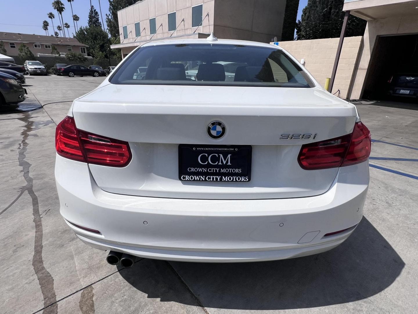 2015 White BMW 3-Series 328i SULEV (WBA3C1C56FK) with an 2.0L L4 DOHC 16V engine, 8-Speed Automatic transmission, located at 30 S. Berkeley Avenue, Pasadena, CA, 91107, (626) 248-7567, 34.145447, -118.109398 - Crown City Motors is a used “Buy Here Pay Here” car dealer in Pasadena CA. “Buy Here Pay Here” financing, means that when you purchase your vehicle from our dealership, that you make the payments to the dealership as well. We do not need the banks approval to get you approved for a used auto - Photo#3