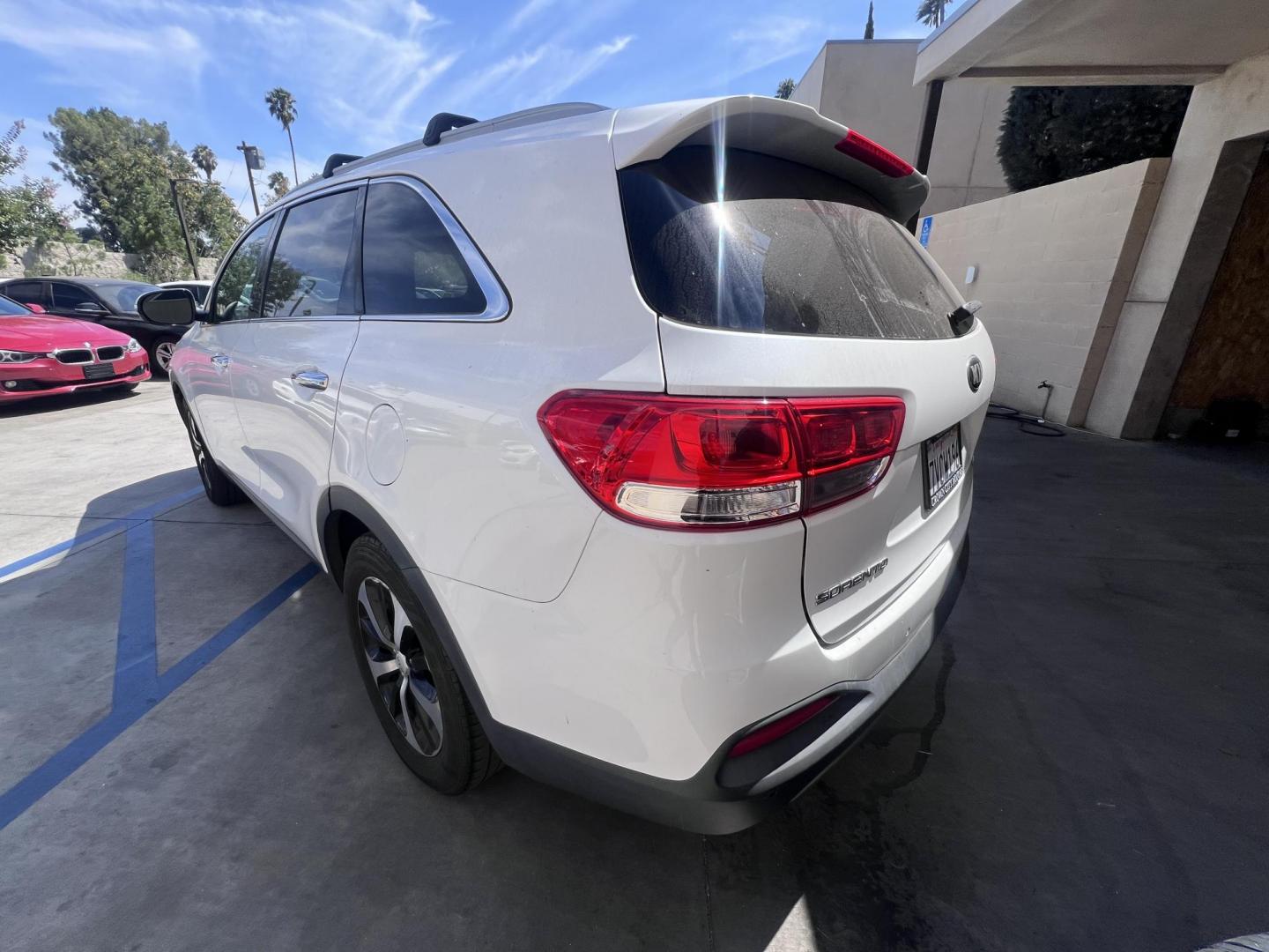 2017 White /BLACK Kia Sorento EX V6 2WD (5XYPH4A5XHG) with an 3.3L V6 DOHC 24V engine, 6A transmission, located at 30 S. Berkeley Avenue, Pasadena, CA, 91107, (626) 248-7567, 34.145447, -118.109398 - Crown City Motors is a used “Buy Here Pay Here” car dealer in Pasadena CA. “Buy Here Pay Here” financing, means that when you purchase your vehicle from our dealership, that you make the payments to the dealership as well. We do not need the banks approval to get you approved for a used auto - Photo#2