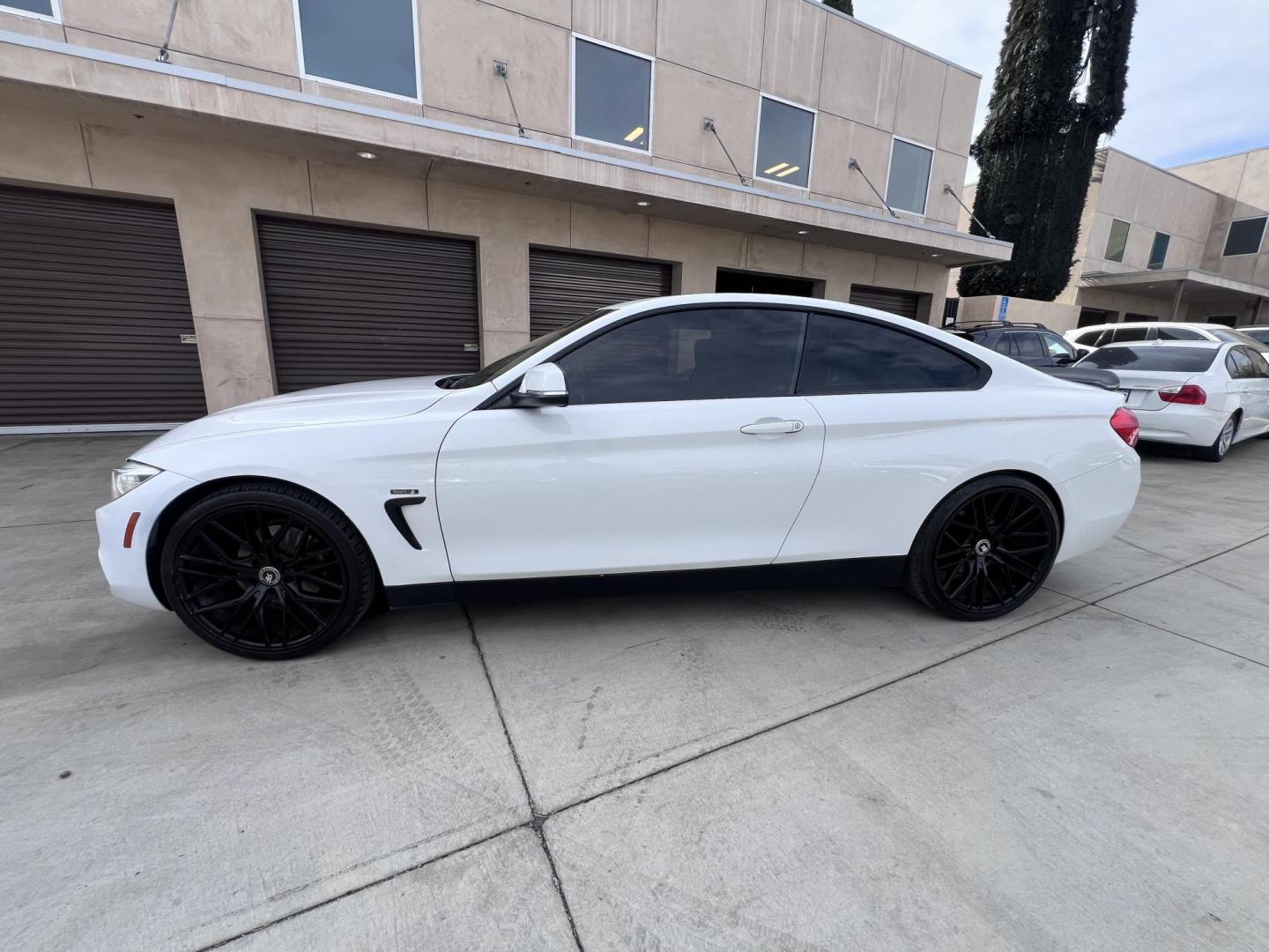 2015 White /black BMW 4-Series 428i SULEV Coupe (WBA3N7C58FK) with an 2.0L L4 DOHC 16V engine, 8-Speed Automatic transmission, located at 30 S. Berkeley Avenue, Pasadena, CA, 91107, (626) 248-7567, 34.145447, -118.109398 - Crown City Motors is a used “Buy Here Pay Here” car dealer in Pasadena CA. “Buy Here Pay Here” financing, means that when you purchase your vehicle from our dealership, that you make the payments to the dealership as well. We do not need the banks approval to get you approved for a used auto - Photo#1
