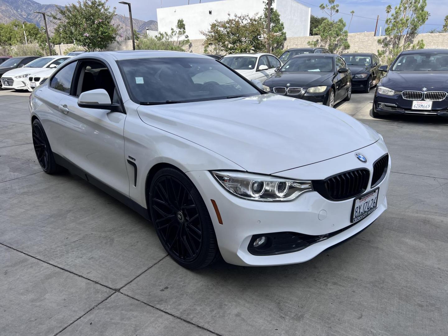 2015 White /black BMW 4-Series 428i SULEV Coupe (WBA3N7C58FK) with an 2.0L L4 DOHC 16V engine, 8-Speed Automatic transmission, located at 30 S. Berkeley Avenue, Pasadena, CA, 91107, (626) 248-7567, 34.145447, -118.109398 - Crown City Motors is a used “Buy Here Pay Here” car dealer in Pasadena CA. “Buy Here Pay Here” financing, means that when you purchase your vehicle from our dealership, that you make the payments to the dealership as well. We do not need the banks approval to get you approved for a used auto - Photo#2