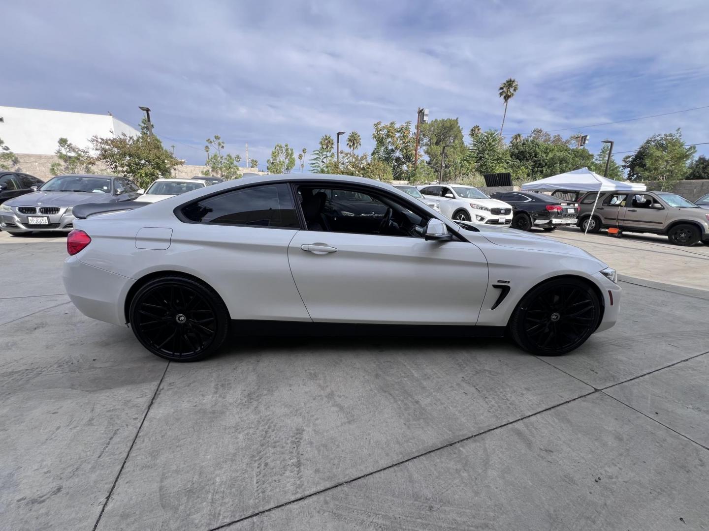 2015 White /black BMW 4-Series 428i SULEV Coupe (WBA3N7C58FK) with an 2.0L L4 DOHC 16V engine, 8-Speed Automatic transmission, located at 30 S. Berkeley Avenue, Pasadena, CA, 91107, (626) 248-7567, 34.145447, -118.109398 - Crown City Motors is a used “Buy Here Pay Here” car dealer in Pasadena CA. “Buy Here Pay Here” financing, means that when you purchase your vehicle from our dealership, that you make the payments to the dealership as well. We do not need the banks approval to get you approved for a used auto - Photo#3