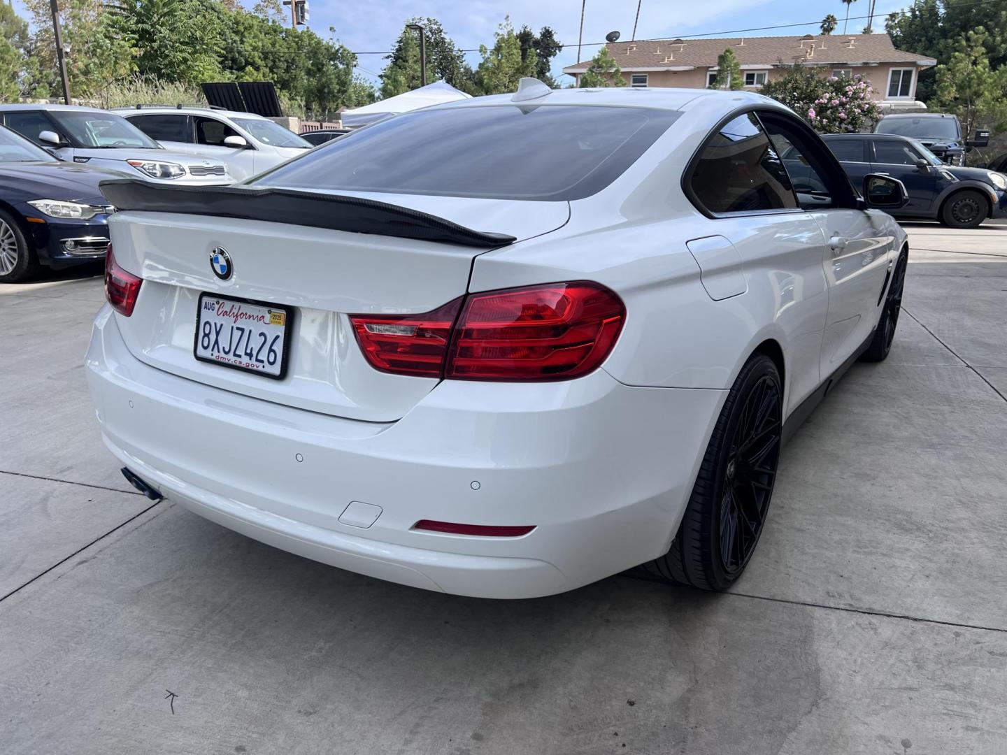 2015 White /black BMW 4-Series 428i SULEV Coupe (WBA3N7C58FK) with an 2.0L L4 DOHC 16V engine, 8-Speed Automatic transmission, located at 30 S. Berkeley Avenue, Pasadena, CA, 91107, (626) 248-7567, 34.145447, -118.109398 - Crown City Motors is a used “Buy Here Pay Here” car dealer in Pasadena CA. “Buy Here Pay Here” financing, means that when you purchase your vehicle from our dealership, that you make the payments to the dealership as well. We do not need the banks approval to get you approved for a used auto - Photo#4