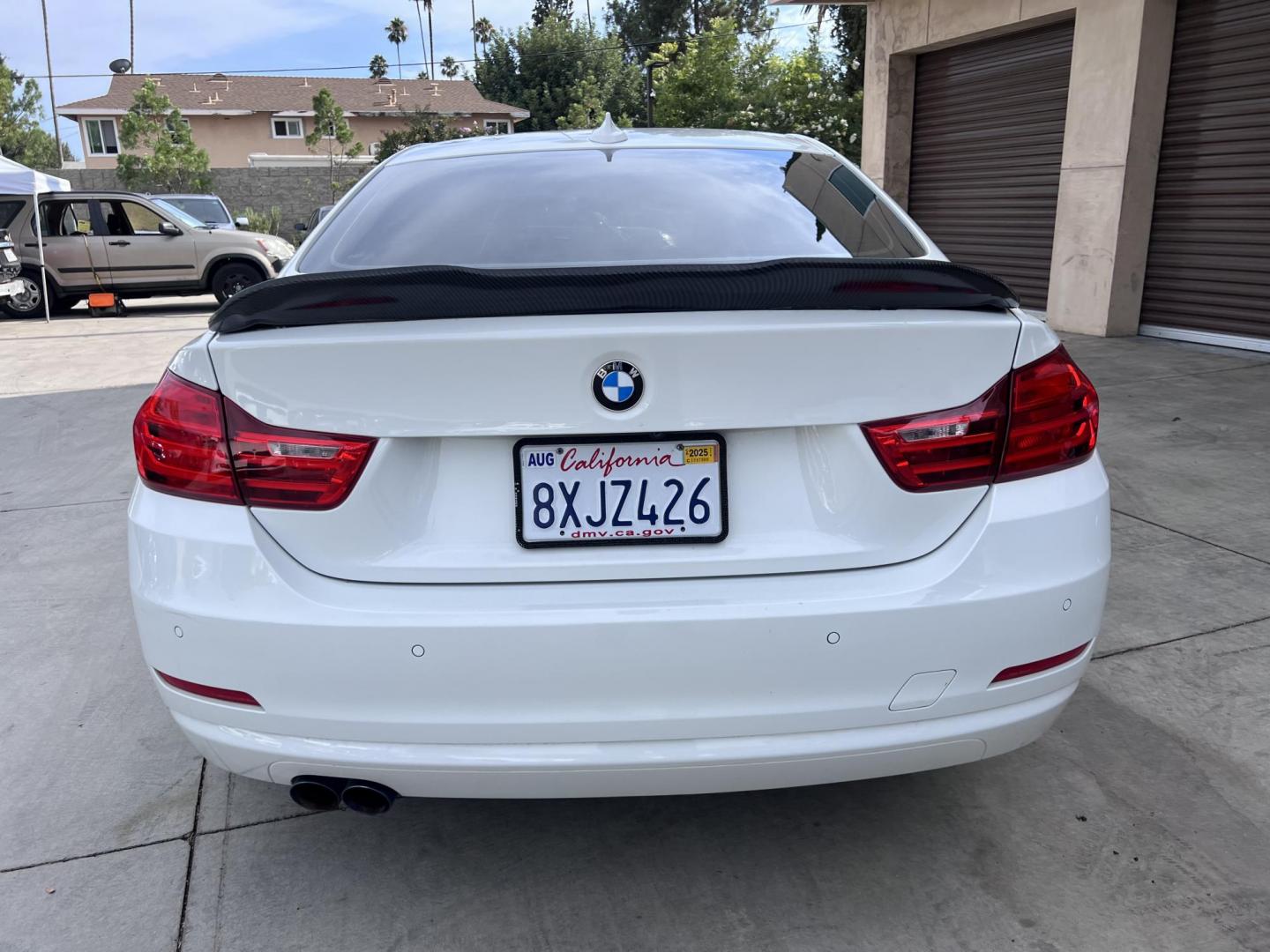 2015 White /black BMW 4-Series 428i SULEV Coupe (WBA3N7C58FK) with an 2.0L L4 DOHC 16V engine, 8-Speed Automatic transmission, located at 30 S. Berkeley Avenue, Pasadena, CA, 91107, (626) 248-7567, 34.145447, -118.109398 - Crown City Motors is a used “Buy Here Pay Here” car dealer in Pasadena CA. “Buy Here Pay Here” financing, means that when you purchase your vehicle from our dealership, that you make the payments to the dealership as well. We do not need the banks approval to get you approved for a used auto - Photo#5