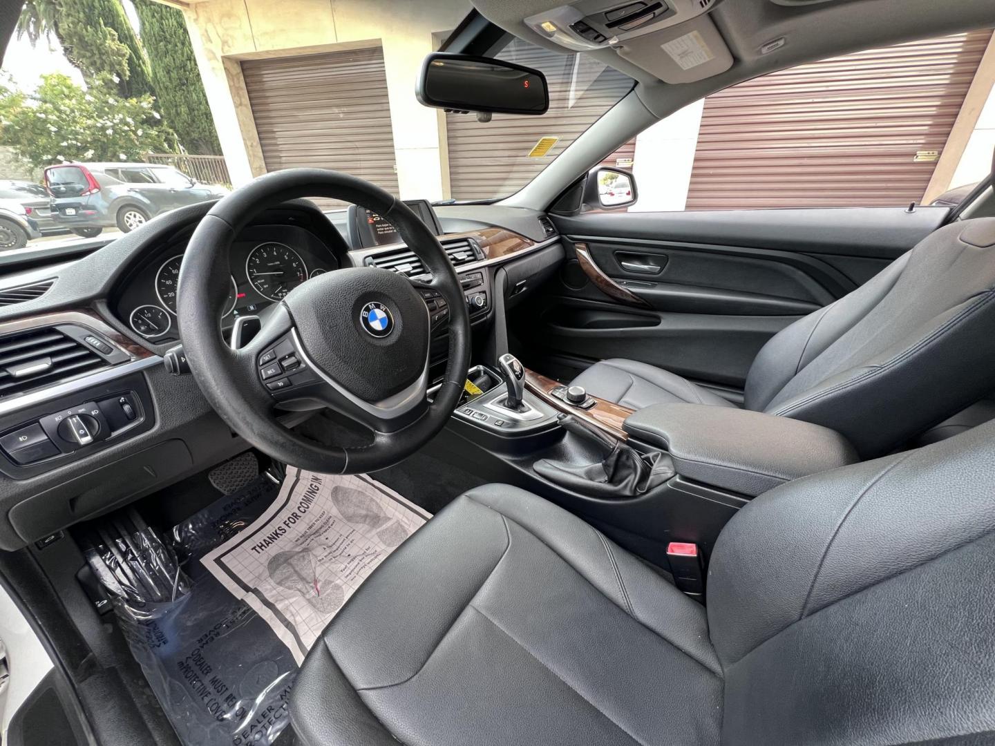2015 White /black BMW 4-Series 428i SULEV Coupe (WBA3N7C58FK) with an 2.0L L4 DOHC 16V engine, 8-Speed Automatic transmission, located at 30 S. Berkeley Avenue, Pasadena, CA, 91107, (626) 248-7567, 34.145447, -118.109398 - Crown City Motors is a used “Buy Here Pay Here” car dealer in Pasadena CA. “Buy Here Pay Here” financing, means that when you purchase your vehicle from our dealership, that you make the payments to the dealership as well. We do not need the banks approval to get you approved for a used auto - Photo#7