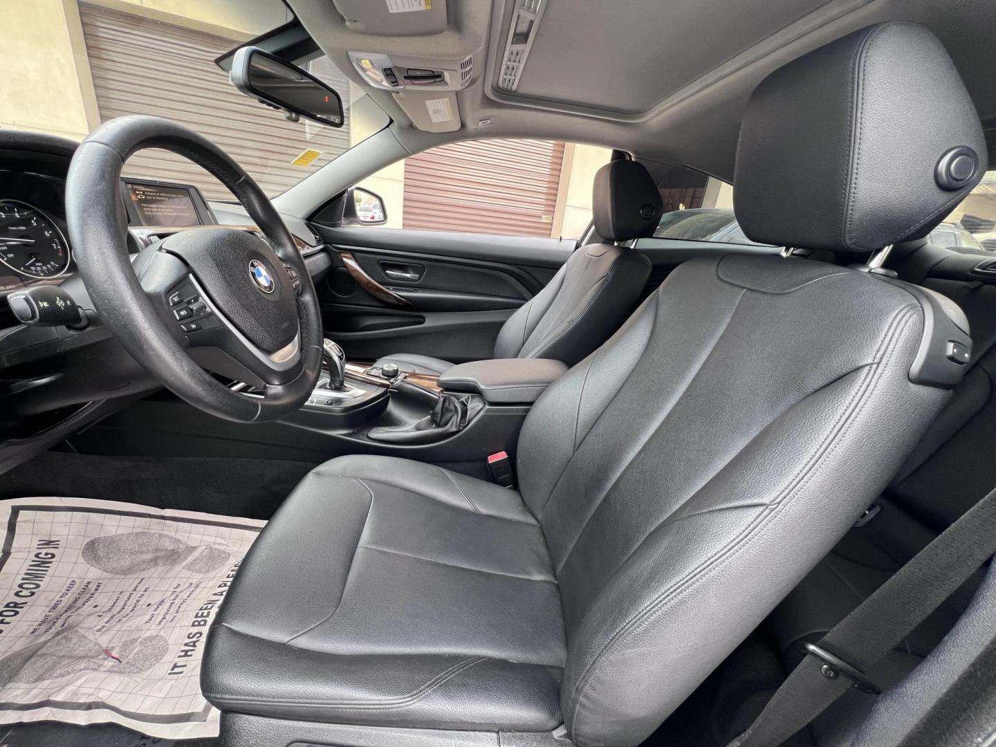 2015 White /black BMW 4-Series 428i SULEV Coupe (WBA3N7C58FK) with an 2.0L L4 DOHC 16V engine, 8-Speed Automatic transmission, located at 30 S. Berkeley Avenue, Pasadena, CA, 91107, (626) 248-7567, 34.145447, -118.109398 - Crown City Motors is a used “Buy Here Pay Here” car dealer in Pasadena CA. “Buy Here Pay Here” financing, means that when you purchase your vehicle from our dealership, that you make the payments to the dealership as well. We do not need the banks approval to get you approved for a used auto - Photo#8