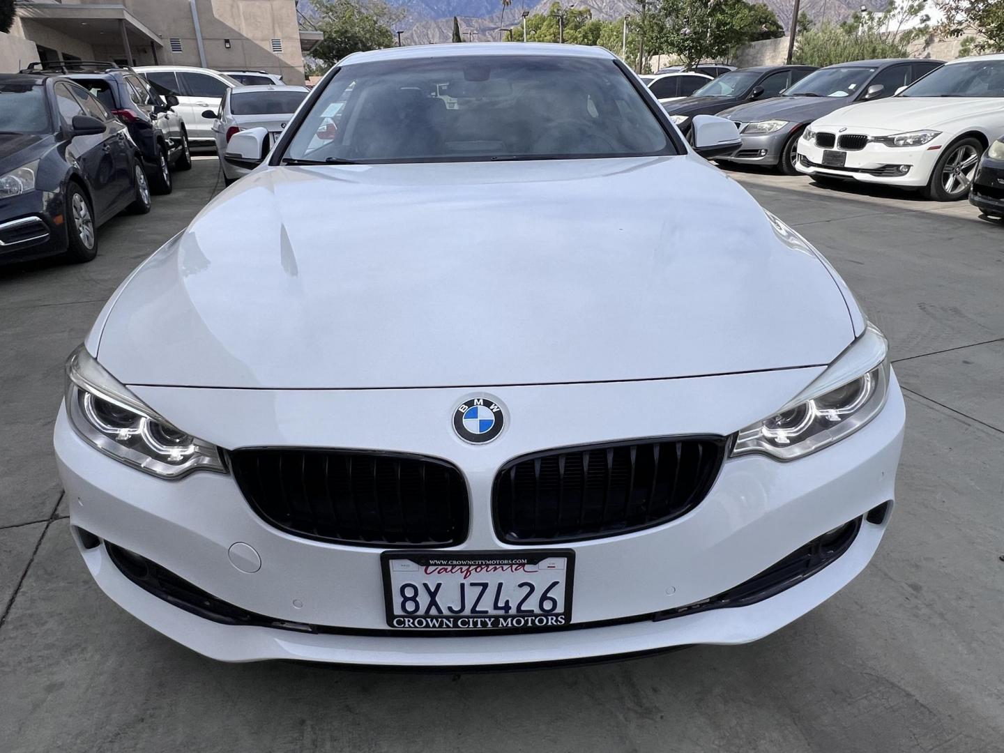 2015 White /black BMW 4-Series 428i SULEV Coupe (WBA3N7C58FK) with an 2.0L L4 DOHC 16V engine, 8-Speed Automatic transmission, located at 30 S. Berkeley Avenue, Pasadena, CA, 91107, (626) 248-7567, 34.145447, -118.109398 - Crown City Motors is a used “Buy Here Pay Here” car dealer in Pasadena CA. “Buy Here Pay Here” financing, means that when you purchase your vehicle from our dealership, that you make the payments to the dealership as well. We do not need the banks approval to get you approved for a used auto - Photo#11
