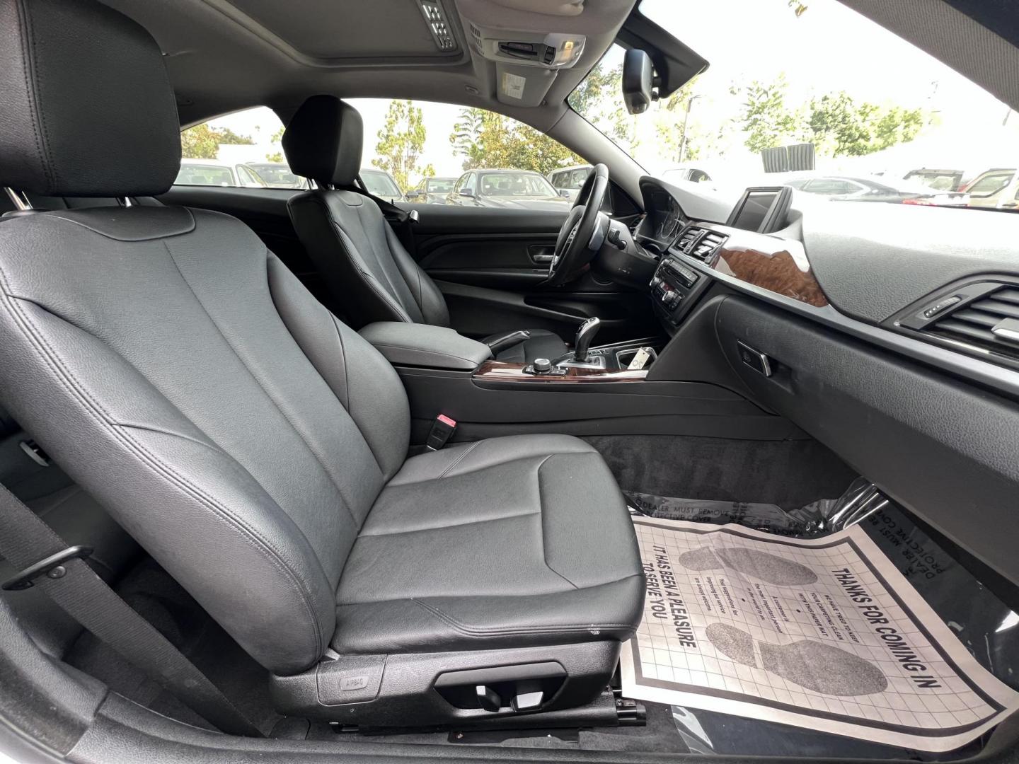 2015 White /black BMW 4-Series 428i SULEV Coupe (WBA3N7C58FK) with an 2.0L L4 DOHC 16V engine, 8-Speed Automatic transmission, located at 30 S. Berkeley Avenue, Pasadena, CA, 91107, (626) 248-7567, 34.145447, -118.109398 - Crown City Motors is a used “Buy Here Pay Here” car dealer in Pasadena CA. “Buy Here Pay Here” financing, means that when you purchase your vehicle from our dealership, that you make the payments to the dealership as well. We do not need the banks approval to get you approved for a used auto - Photo#13