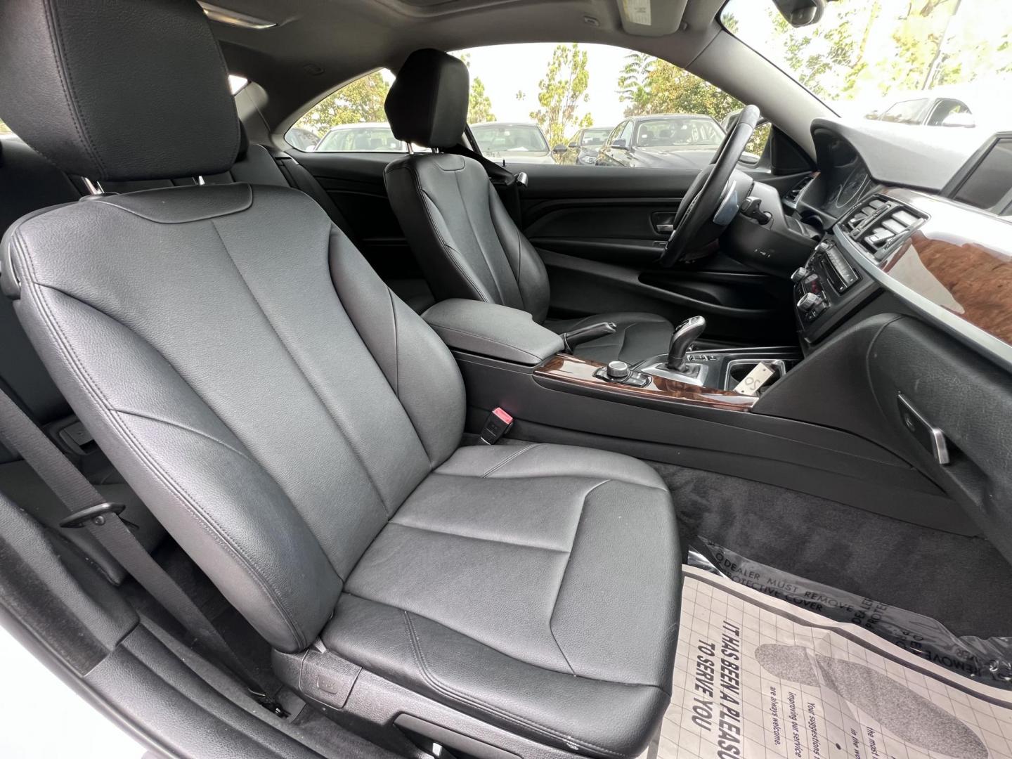 2015 White /black BMW 4-Series 428i SULEV Coupe (WBA3N7C58FK) with an 2.0L L4 DOHC 16V engine, 8-Speed Automatic transmission, located at 30 S. Berkeley Avenue, Pasadena, CA, 91107, (626) 248-7567, 34.145447, -118.109398 - Crown City Motors is a used “Buy Here Pay Here” car dealer in Pasadena CA. “Buy Here Pay Here” financing, means that when you purchase your vehicle from our dealership, that you make the payments to the dealership as well. We do not need the banks approval to get you approved for a used auto - Photo#12