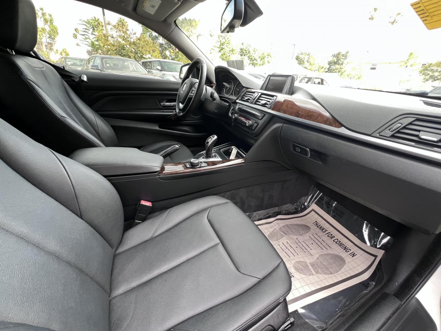 2015 White /black BMW 4-Series 428i SULEV Coupe (WBA3N7C58FK) with an 2.0L L4 DOHC 16V engine, 8-Speed Automatic transmission, located at 30 S. Berkeley Avenue, Pasadena, CA, 91107, (626) 248-7567, 34.145447, -118.109398 - Crown City Motors is a used “Buy Here Pay Here” car dealer in Pasadena CA. “Buy Here Pay Here” financing, means that when you purchase your vehicle from our dealership, that you make the payments to the dealership as well. We do not need the banks approval to get you approved for a used auto - Photo#21