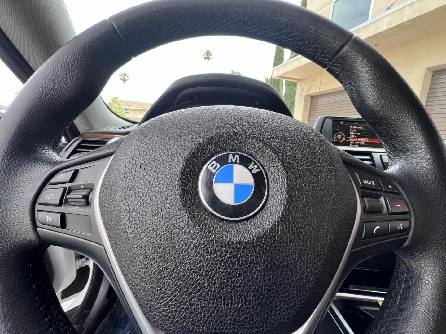 2015 White /black BMW 4-Series 428i SULEV Coupe (WBA3N7C58FK) with an 2.0L L4 DOHC 16V engine, 8-Speed Automatic transmission, located at 30 S. Berkeley Avenue, Pasadena, CA, 91107, (626) 248-7567, 34.145447, -118.109398 - Crown City Motors is a used “Buy Here Pay Here” car dealer in Pasadena CA. “Buy Here Pay Here” financing, means that when you purchase your vehicle from our dealership, that you make the payments to the dealership as well. We do not need the banks approval to get you approved for a used auto - Photo#26