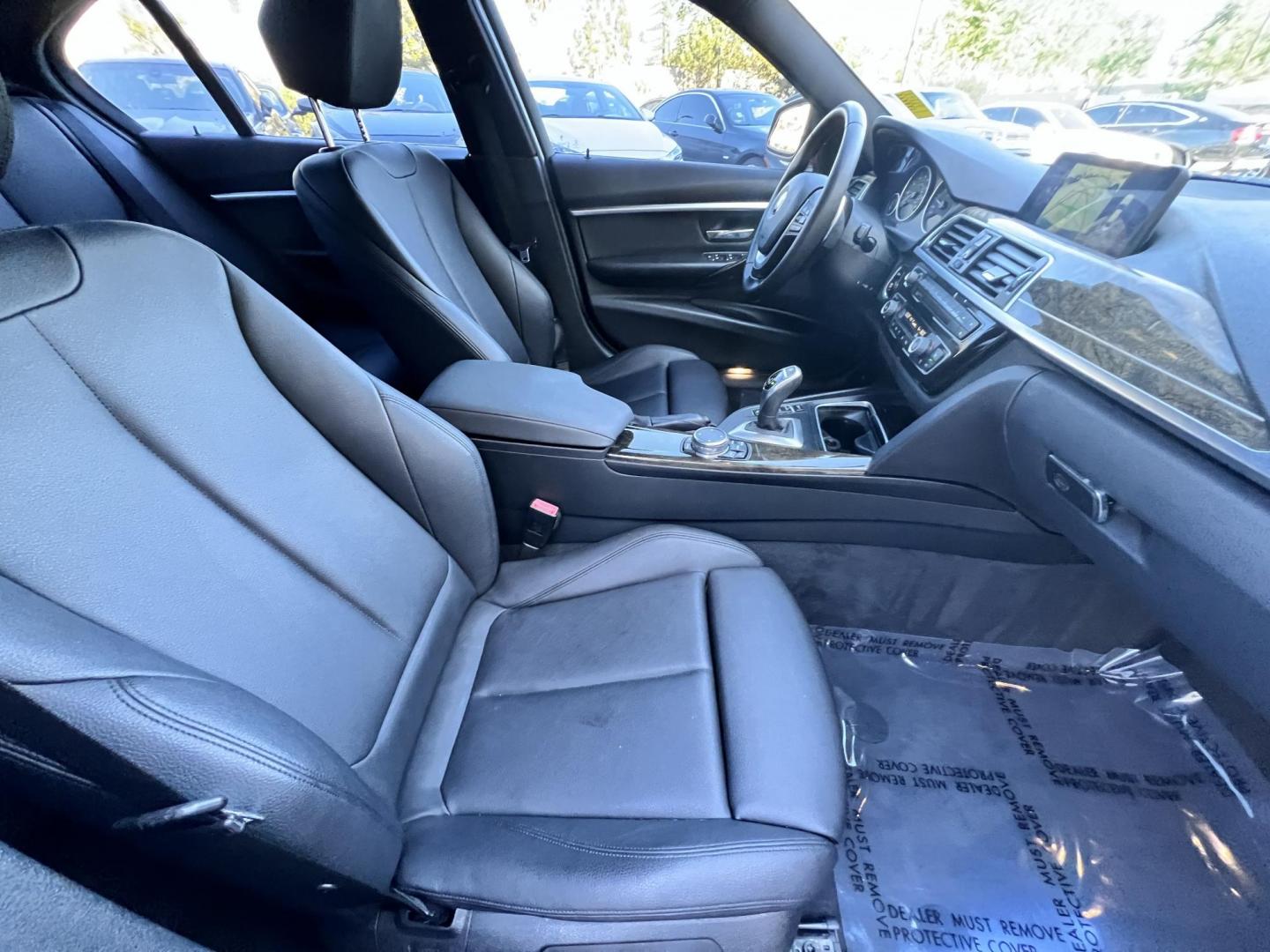 2016 Black /BLACK BMW 3-Series 328i SULEV (WBA8E9G50GN) with an 2.0L L4 DOHC 16V engine, AUTOMATIC transmission, located at 30 S. Berkeley Avenue, Pasadena, CA, 91107, (626) 248-7567, 34.145447, -118.109398 - Crown City Motors is a used “Buy Here Pay Here” car dealer in Pasadena CA. “Buy Here Pay Here” financing, means that when you purchase your vehicle from our dealership, that you make the payments to the dealership as well. We do not need the banks approval to get you approved for a used auto - Photo#16