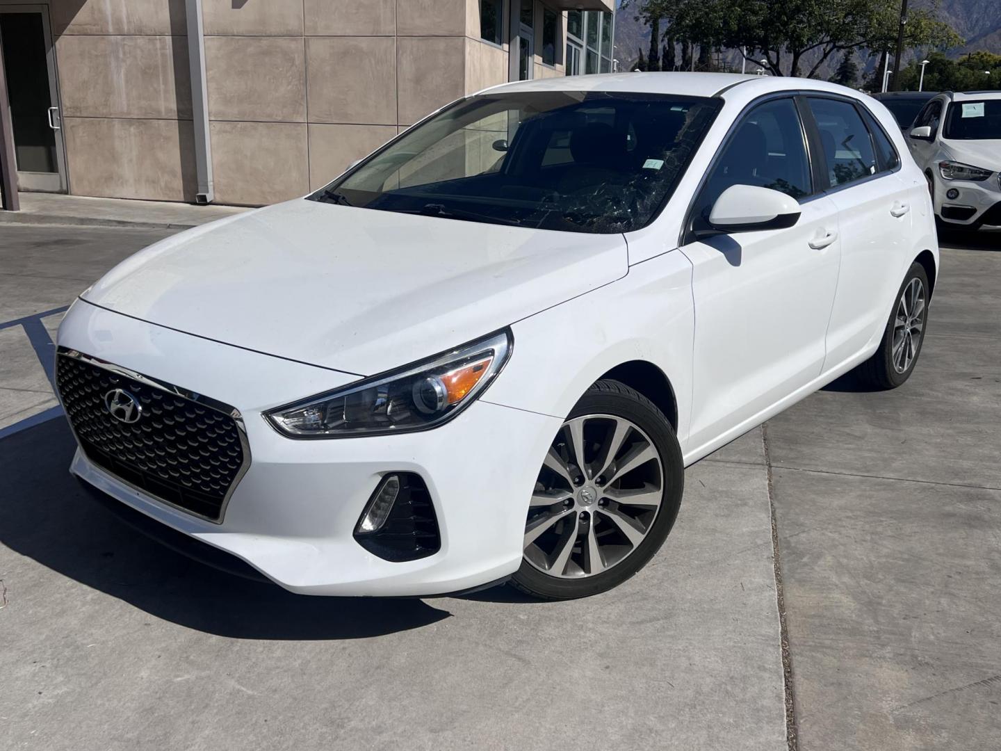 2018 White Hyundai Elantra GT 2.0L 6A (KMHH35LEXJU) with an 2.0L L4 16V DOHC engine, 6A transmission, located at 30 S. Berkeley Avenue, Pasadena, CA, 91107, (626) 248-7567, 34.145447, -118.109398 - Crown City Motors is a used “Buy Here Pay Here” car dealer in Pasadena CA. “Buy Here Pay Here” financing, means that when you purchase your vehicle from our dealership, that you make the payments to the dealership as well. We do not need the banks approval to get you approved for a used auto - Photo#0
