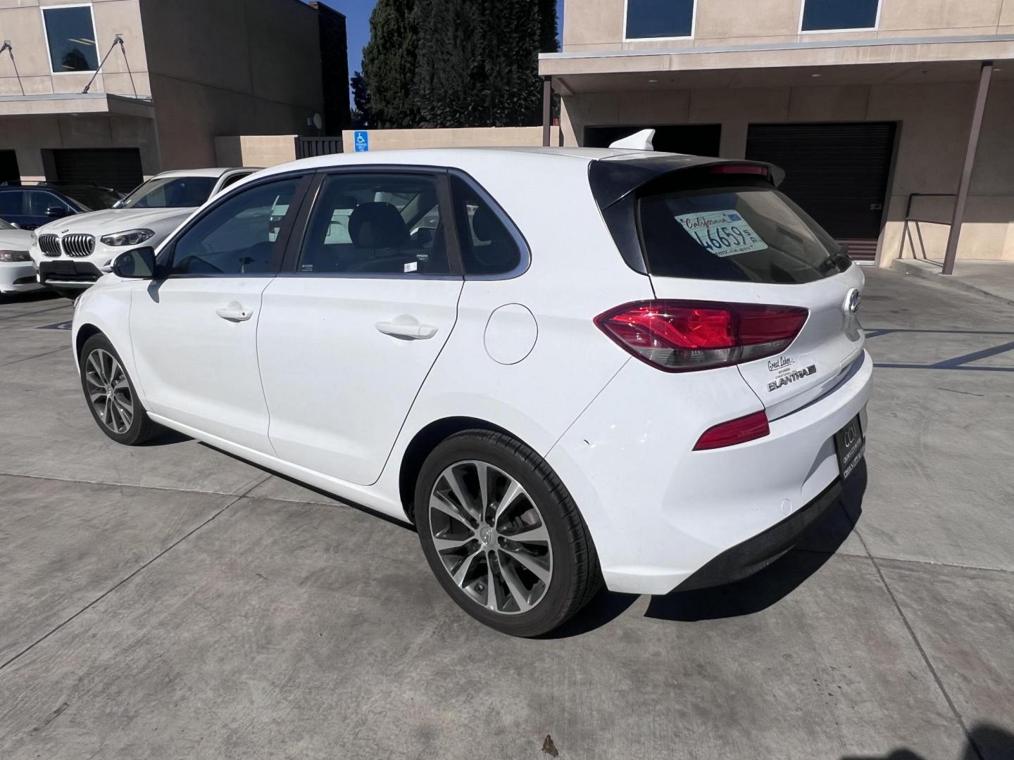2018 White Hyundai Elantra GT 2.0L 6A (KMHH35LEXJU) with an 2.0L L4 16V DOHC engine, 6A transmission, located at 30 S. Berkeley Avenue, Pasadena, CA, 91107, (626) 248-7567, 34.145447, -118.109398 - Crown City Motors is a used “Buy Here Pay Here” car dealer in Pasadena CA. “Buy Here Pay Here” financing, means that when you purchase your vehicle from our dealership, that you make the payments to the dealership as well. We do not need the banks approval to get you approved for a used auto - Photo#2