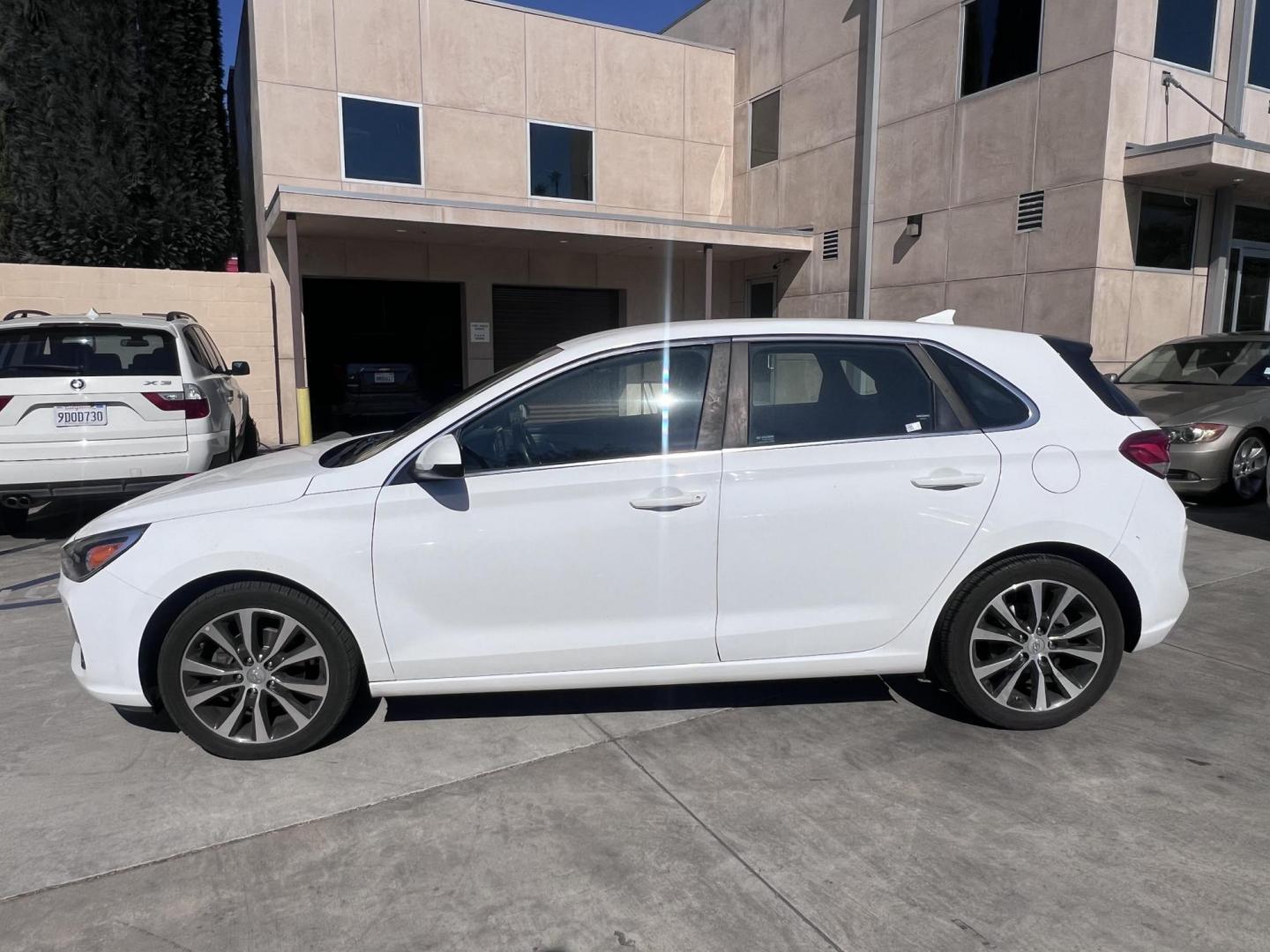 2018 White Hyundai Elantra GT 2.0L 6A (KMHH35LEXJU) with an 2.0L L4 16V DOHC engine, 6A transmission, located at 30 S. Berkeley Avenue, Pasadena, CA, 91107, (626) 248-7567, 34.145447, -118.109398 - Crown City Motors is a used “Buy Here Pay Here” car dealer in Pasadena CA. “Buy Here Pay Here” financing, means that when you purchase your vehicle from our dealership, that you make the payments to the dealership as well. We do not need the banks approval to get you approved for a used auto - Photo#1
