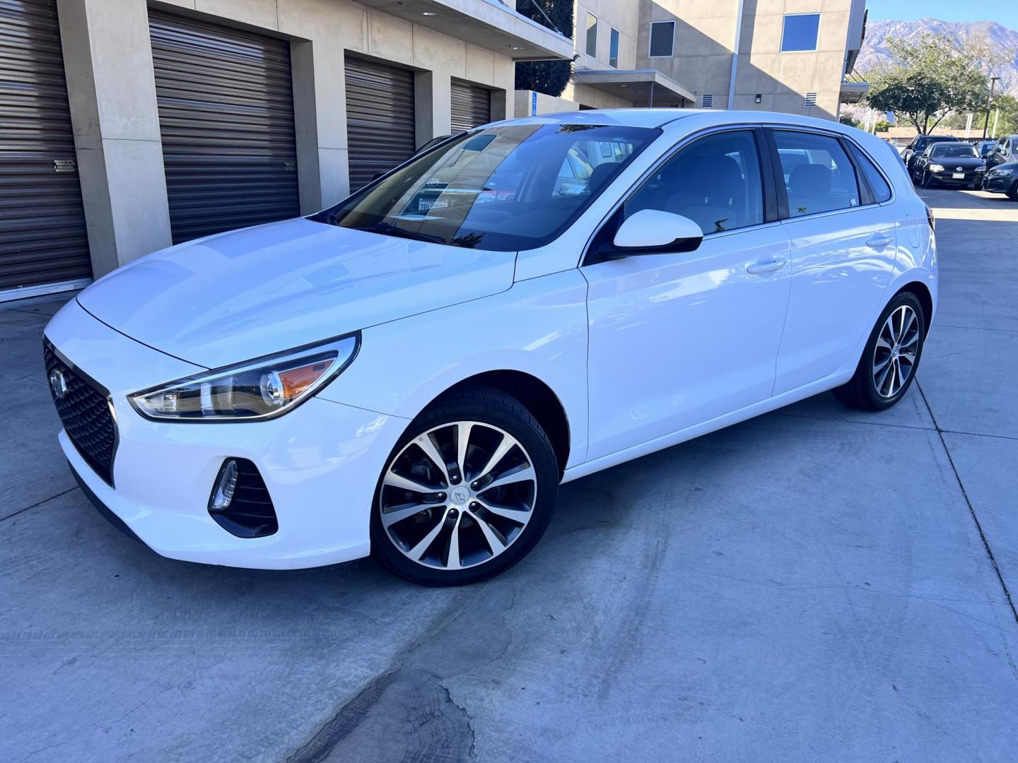 2018 White Hyundai Elantra GT 2.0L 6A (KMHH35LEXJU) with an 2.0L L4 16V DOHC engine, 6A transmission, located at 30 S. Berkeley Avenue, Pasadena, CA, 91107, (626) 248-7567, 34.145447, -118.109398 - Crown City Motors is a used “Buy Here Pay Here” car dealer in Pasadena CA. “Buy Here Pay Here” financing, means that when you purchase your vehicle from our dealership, that you make the payments to the dealership as well. We do not need the banks approval to get you approved for a used auto - Photo#4