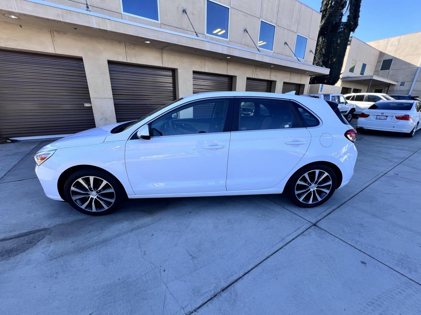 2018 White Hyundai Elantra GT 2.0L 6A (KMHH35LEXJU) with an 2.0L L4 16V DOHC engine, 6A transmission, located at 30 S. Berkeley Avenue, Pasadena, CA, 91107, (626) 248-7567, 34.145447, -118.109398 - Crown City Motors is a used “Buy Here Pay Here” car dealer in Pasadena CA. “Buy Here Pay Here” financing, means that when you purchase your vehicle from our dealership, that you make the payments to the dealership as well. We do not need the banks approval to get you approved for a used auto - Photo#5