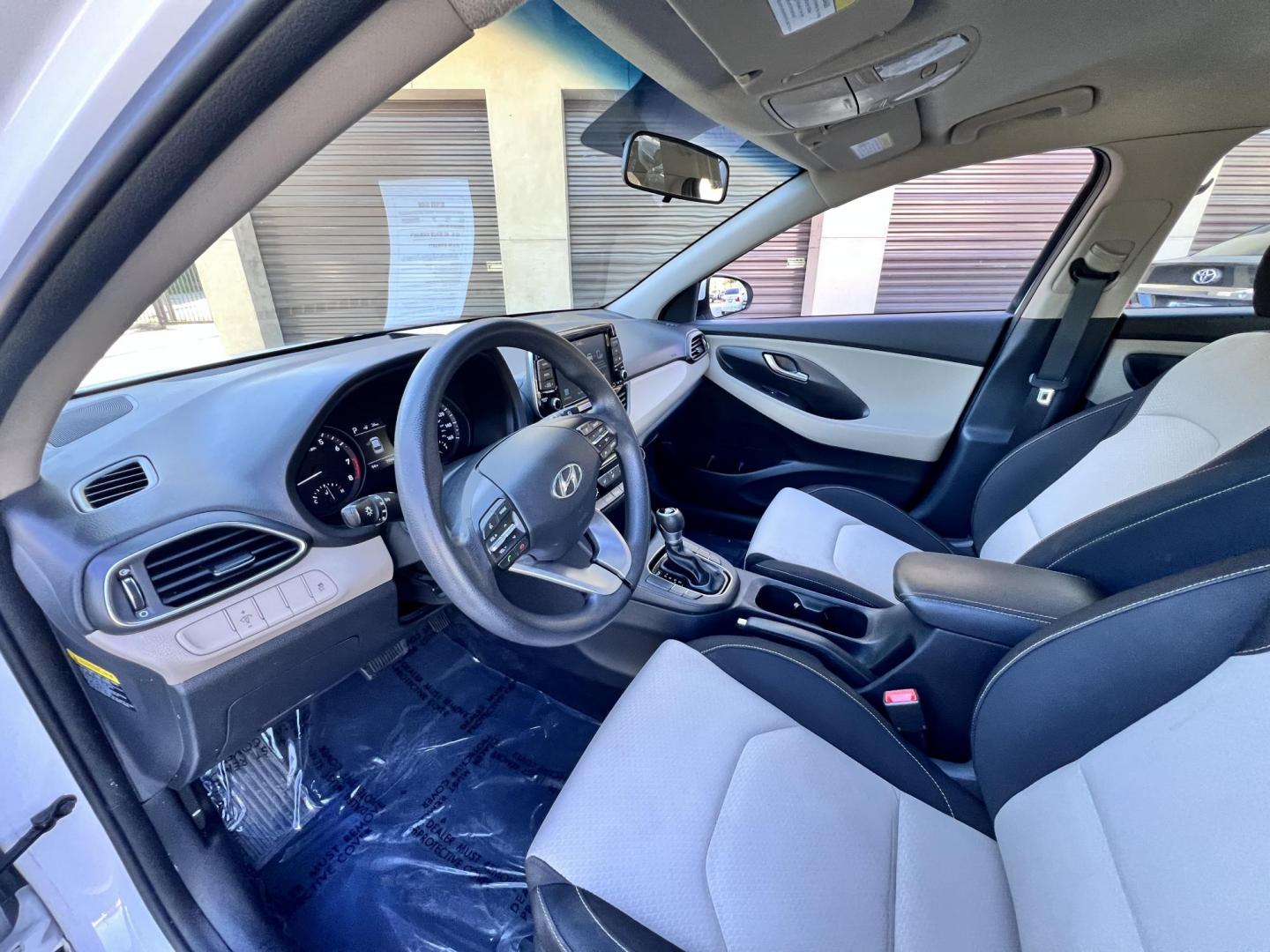 2018 White Hyundai Elantra GT 2.0L 6A (KMHH35LEXJU) with an 2.0L L4 16V DOHC engine, 6A transmission, located at 30 S. Berkeley Avenue, Pasadena, CA, 91107, (626) 248-7567, 34.145447, -118.109398 - Crown City Motors is a used “Buy Here Pay Here” car dealer in Pasadena CA. “Buy Here Pay Here” financing, means that when you purchase your vehicle from our dealership, that you make the payments to the dealership as well. We do not need the banks approval to get you approved for a used auto - Photo#16