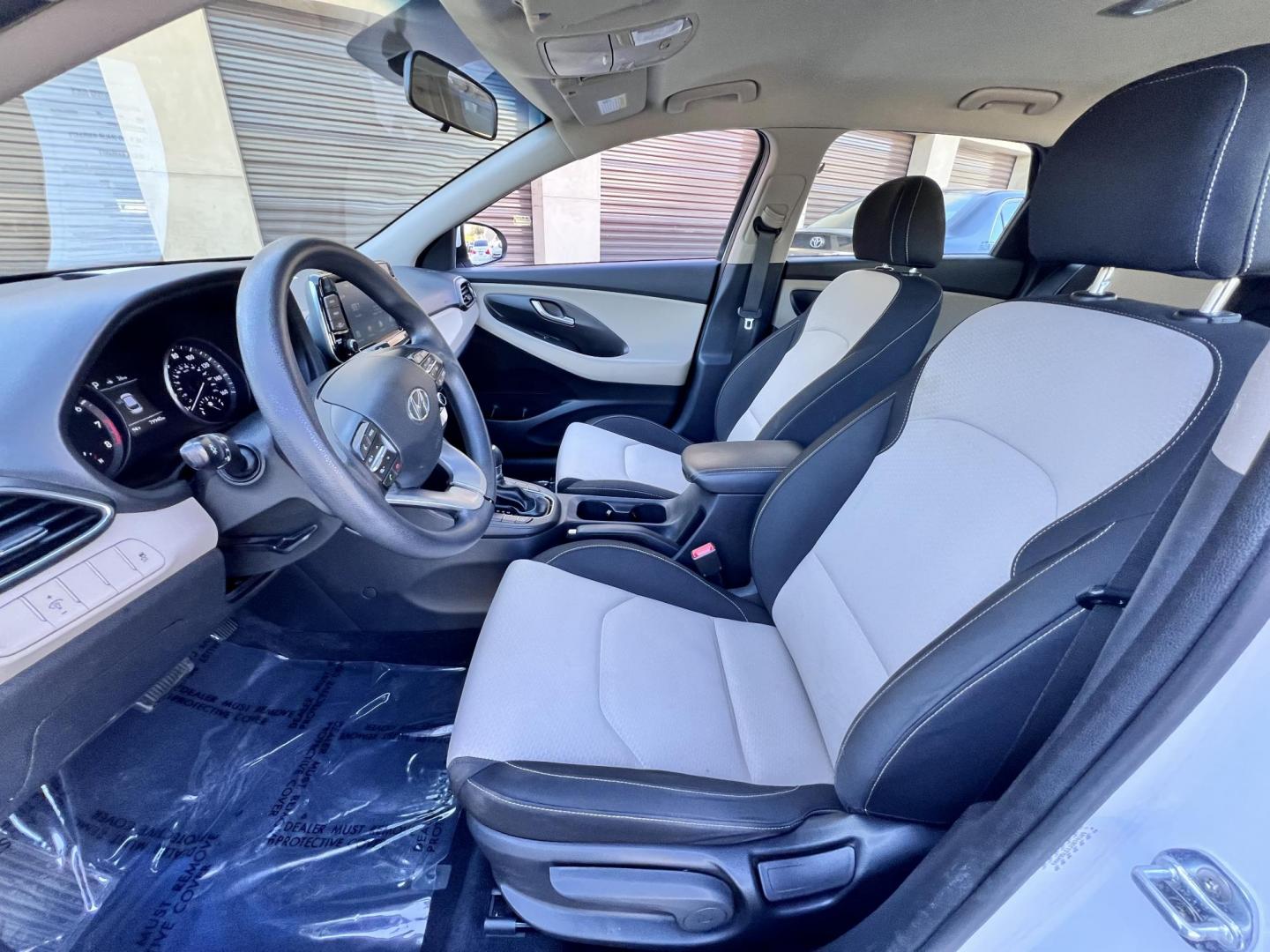 2018 White Hyundai Elantra GT 2.0L 6A (KMHH35LEXJU) with an 2.0L L4 16V DOHC engine, 6A transmission, located at 30 S. Berkeley Avenue, Pasadena, CA, 91107, (626) 248-7567, 34.145447, -118.109398 - Crown City Motors is a used “Buy Here Pay Here” car dealer in Pasadena CA. “Buy Here Pay Here” financing, means that when you purchase your vehicle from our dealership, that you make the payments to the dealership as well. We do not need the banks approval to get you approved for a used auto - Photo#17