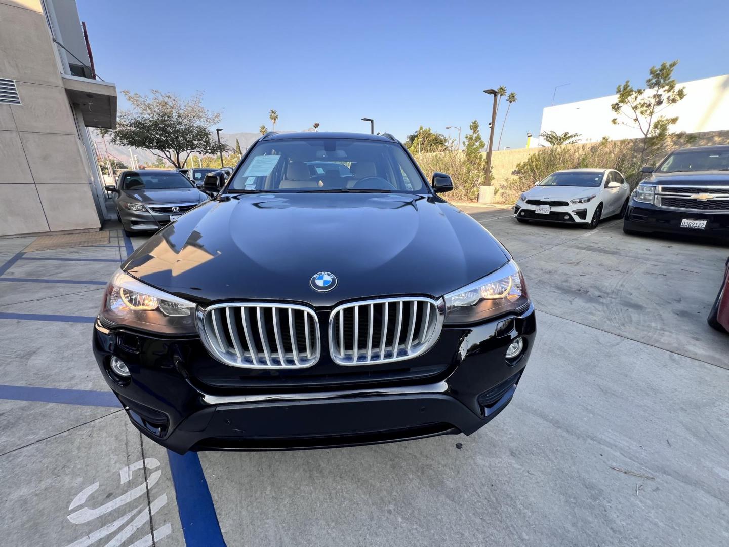 2017 Black /Tan BMW X3 sDrive28i (5UXWZ7C34H0) with an 2.0L L4 DOHC 16V engine, 8A transmission, located at 30 S. Berkeley Avenue, Pasadena, CA, 91107, (626) 248-7567, 34.145447, -118.109398 - Buy Here Pay Here – Crown City Motors Pasadena, CA Bad Credit? No Credit? You’re Approved! Apply Now ? Start Your Application Reference VIN: 5UXWZ7C34H0V88008 At Crown City Motors, we believe everyone deserves reliable transportation—regardless of credit history. If banks have said n - Photo#3