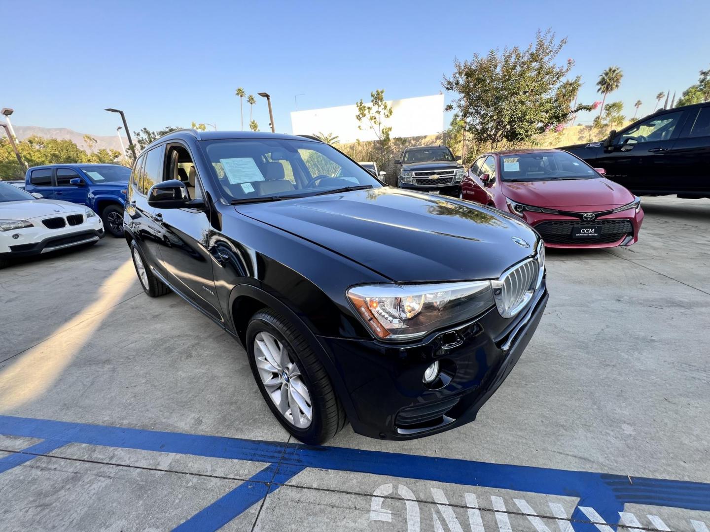 2017 Black /Tan BMW X3 sDrive28i (5UXWZ7C34H0) with an 2.0L L4 DOHC 16V engine, 8A transmission, located at 30 S. Berkeley Avenue, Pasadena, CA, 91107, (626) 248-7567, 34.145447, -118.109398 - Buy Here Pay Here – Crown City Motors Pasadena, CA Bad Credit? No Credit? You’re Approved! Apply Now ? Start Your Application Reference VIN: 5UXWZ7C34H0V88008 At Crown City Motors, we believe everyone deserves reliable transportation—regardless of credit history. If banks have said n - Photo#4