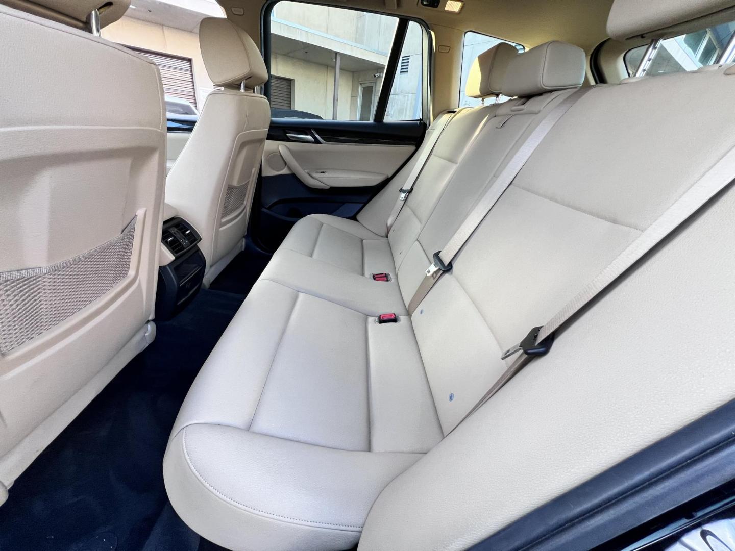 2017 Black /Tan BMW X3 sDrive28i (5UXWZ7C34H0) with an 2.0L L4 DOHC 16V engine, 8A transmission, located at 30 S. Berkeley Avenue, Pasadena, CA, 91107, (626) 248-7567, 34.145447, -118.109398 - Buy Here Pay Here – Crown City Motors Pasadena, CA Bad Credit? No Credit? You’re Approved! Apply Now ? Start Your Application Reference VIN: 5UXWZ7C34H0V88008 At Crown City Motors, we believe everyone deserves reliable transportation—regardless of credit history. If banks have said n - Photo#12