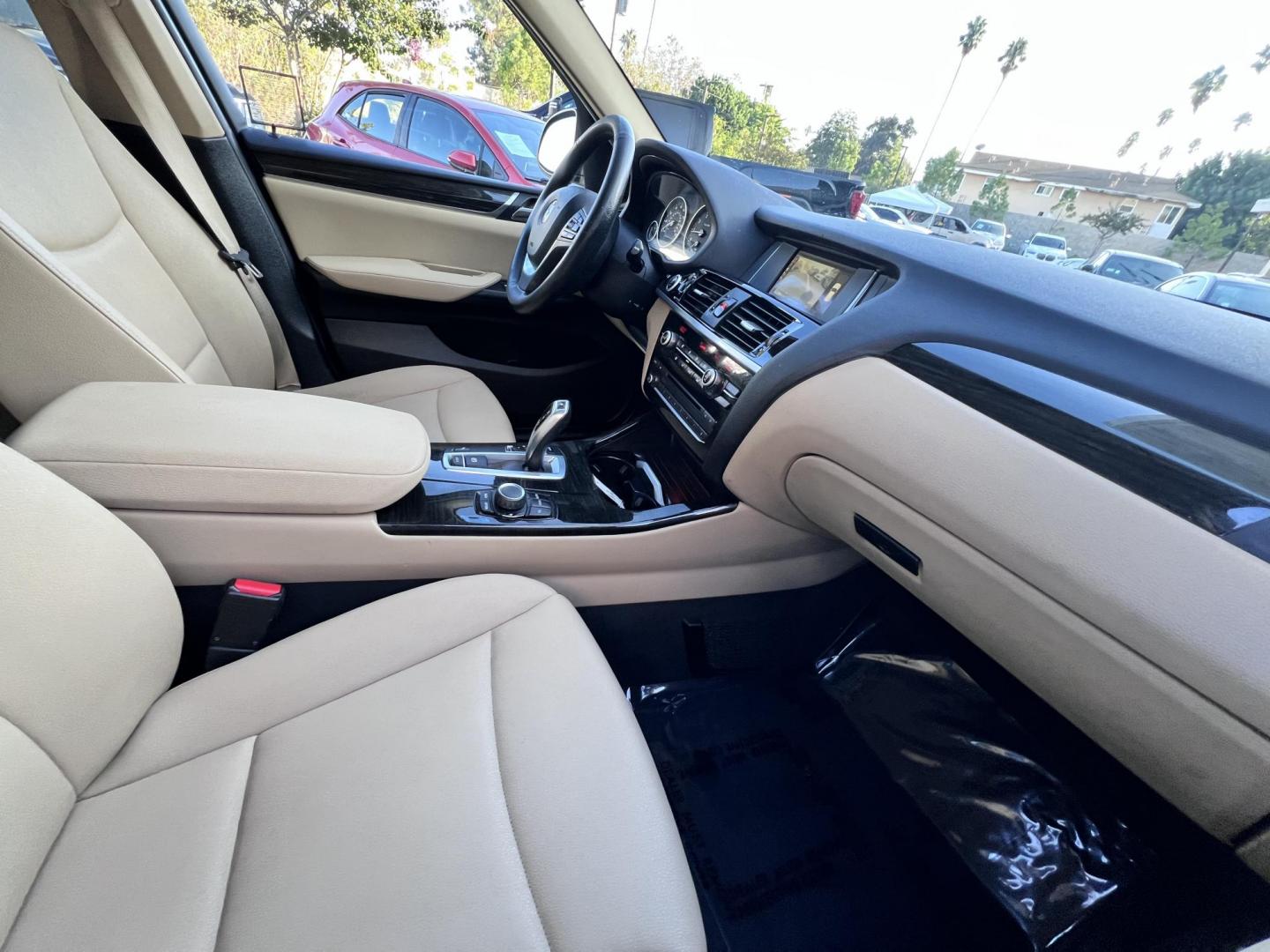 2017 Black /Tan BMW X3 sDrive28i (5UXWZ7C34H0) with an 2.0L L4 DOHC 16V engine, 8A transmission, located at 30 S. Berkeley Avenue, Pasadena, CA, 91107, (626) 248-7567, 34.145447, -118.109398 - Buy Here Pay Here – Crown City Motors Pasadena, CA Bad Credit? No Credit? You’re Approved! Apply Now ? Start Your Application Reference VIN: 5UXWZ7C34H0V88008 At Crown City Motors, we believe everyone deserves reliable transportation—regardless of credit history. If banks have said n - Photo#18
