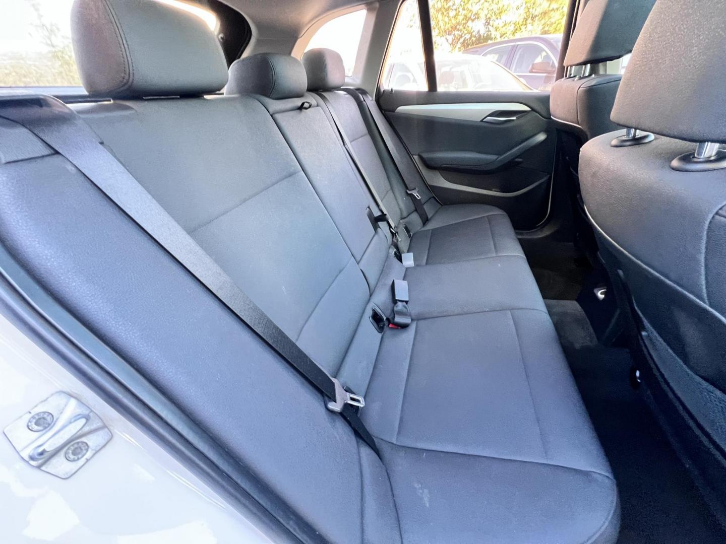 2014 White /beige BMW X1 sDrive28i (WBAVM1C50EV) with an 2.0L L4 DOHC 16V engine, 8-Speed Automatic transmission, located at 30 S. Berkeley Avenue, Pasadena, CA, 91107, (626) 248-7567, 34.145447, -118.109398 - Crown City Motors is a used “Buy Here Pay Here” car dealer in Pasadena CA. “Buy Here Pay Here” financing, means that when you purchase your vehicle from our dealership, that you make the payments to the dealership as well. We do not need the banks approval to get you approved for a used auto - Photo#18