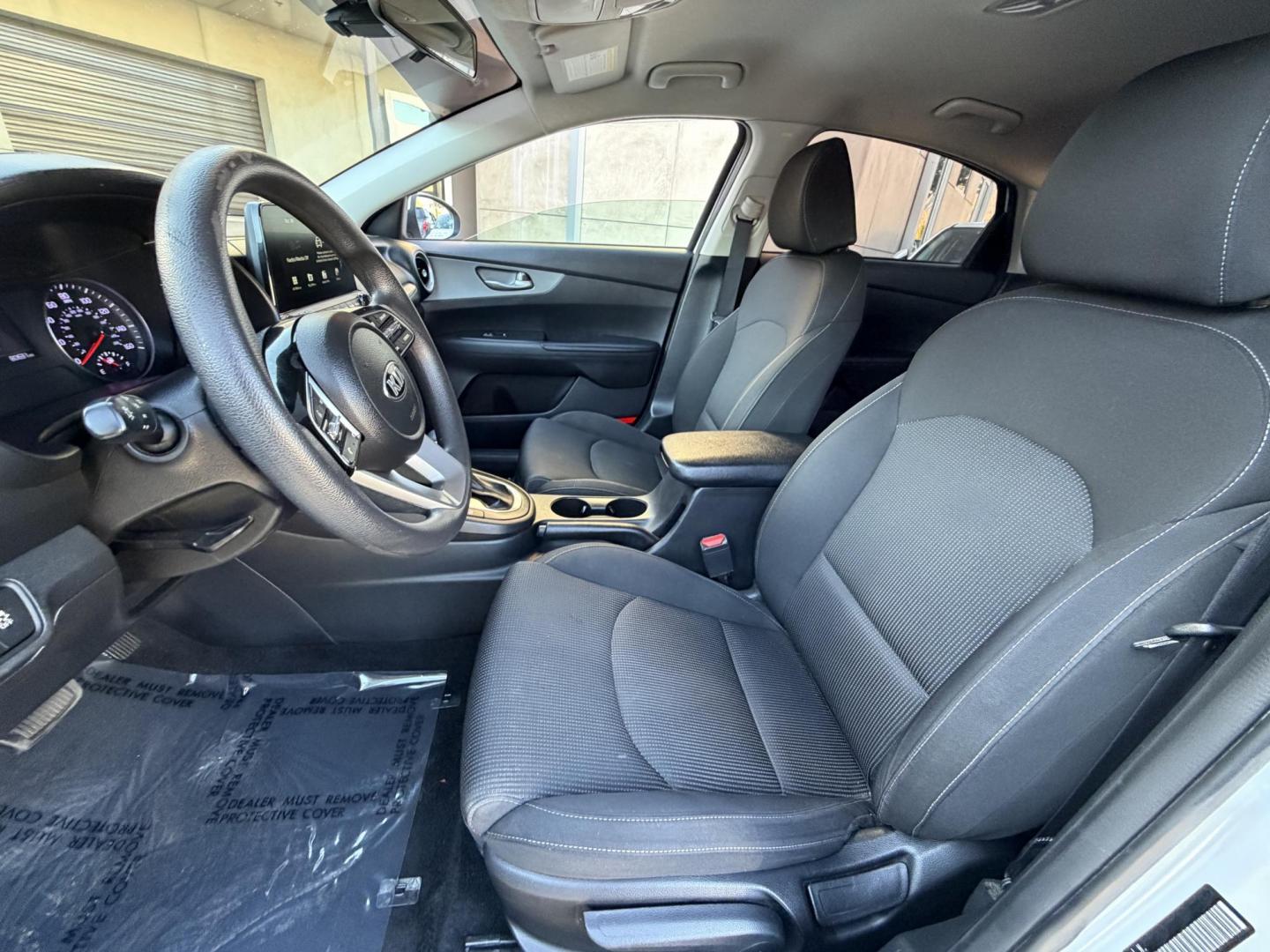 2021 White /black Kia Forte FE (3KPF24AD3ME) with an 2.0L L4 DOHC 16V engine, CVT transmission, located at 30 S. Berkeley Avenue, Pasadena, CA, 91107, (626) 248-7567, 34.145447, -118.109398 - Crown City Motors is a used “Buy Here Pay Here” car dealer in Pasadena CA. “Buy Here Pay Here” financing, means that when you purchase your vehicle from our dealership, that you make the payments to the dealership as well. We do not need the banks approval to get you approved for a used auto - Photo#5