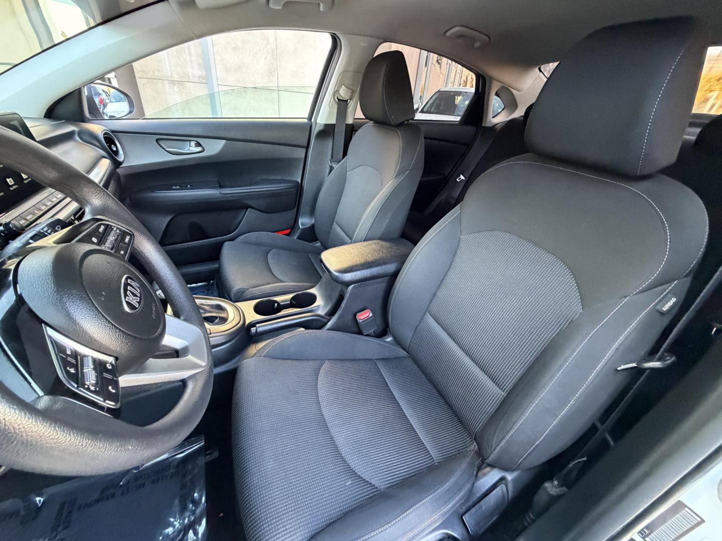 2021 White /black Kia Forte FE (3KPF24AD3ME) with an 2.0L L4 DOHC 16V engine, CVT transmission, located at 30 S. Berkeley Avenue, Pasadena, CA, 91107, (626) 248-7567, 34.145447, -118.109398 - Crown City Motors is a used “Buy Here Pay Here” car dealer in Pasadena CA. “Buy Here Pay Here” financing, means that when you purchase your vehicle from our dealership, that you make the payments to the dealership as well. We do not need the banks approval to get you approved for a used auto - Photo#7