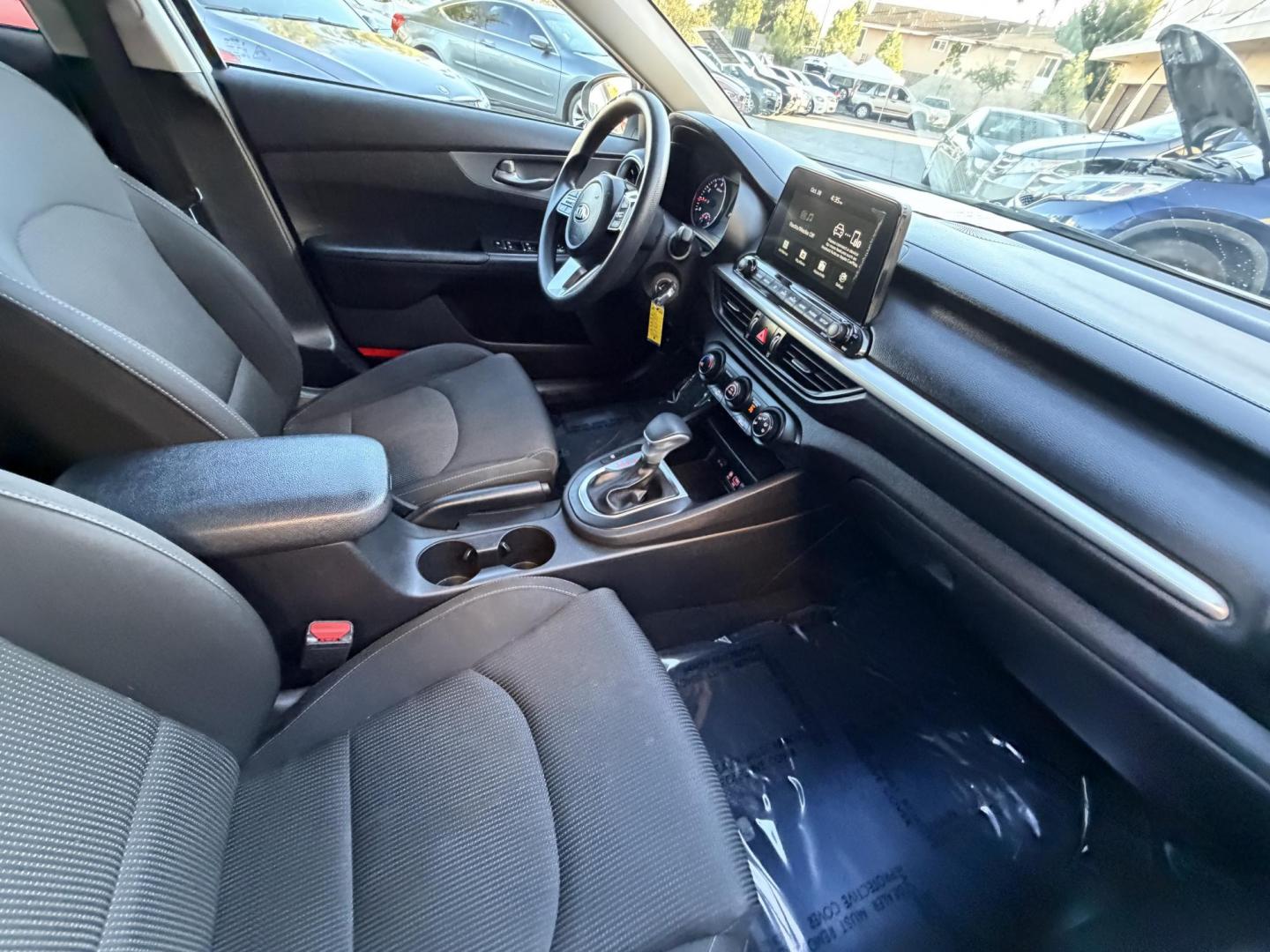 2021 White /black Kia Forte FE (3KPF24AD3ME) with an 2.0L L4 DOHC 16V engine, CVT transmission, located at 30 S. Berkeley Avenue, Pasadena, CA, 91107, (626) 248-7567, 34.145447, -118.109398 - Crown City Motors is a used “Buy Here Pay Here” car dealer in Pasadena CA. “Buy Here Pay Here” financing, means that when you purchase your vehicle from our dealership, that you make the payments to the dealership as well. We do not need the banks approval to get you approved for a used auto - Photo#12