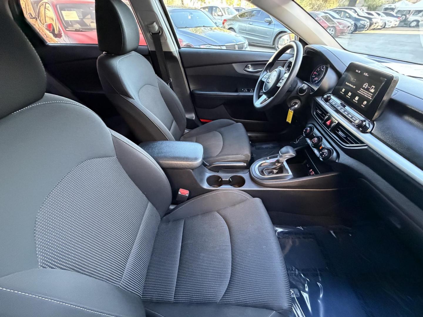 2021 White /black Kia Forte FE (3KPF24AD3ME) with an 2.0L L4 DOHC 16V engine, CVT transmission, located at 30 S. Berkeley Avenue, Pasadena, CA, 91107, (626) 248-7567, 34.145447, -118.109398 - Crown City Motors is a used “Buy Here Pay Here” car dealer in Pasadena CA. “Buy Here Pay Here” financing, means that when you purchase your vehicle from our dealership, that you make the payments to the dealership as well. We do not need the banks approval to get you approved for a used auto - Photo#14