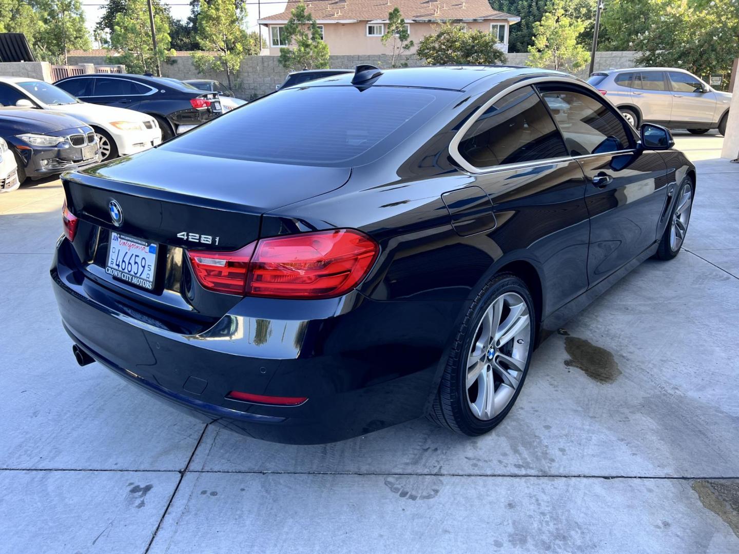 2016 Black /Tan BMW 4-Series 428i SULEV Coupe (WBA3N7C57GK) with an 2.0L L4 DOHC 16V engine, 8A transmission, located at 30 S. Berkeley Avenue, Pasadena, CA, 91107, (626) 248-7567, 34.145447, -118.109398 - At Crown City Motors, we understand that life can throw financial challenges your way. That’s why we proudly offer Buy Here Pay Here (BHPH) financing to help drivers in Pasadena and the greater Los Angeles area get into the vehicles they need — even when traditional lenders say no. One of the st - Photo#9