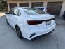 2024 White /BLACK Kia Forte LX (3KPF24AD2RE) with an 2.0L L4 DOHC 16V engine, CVT transmission, located at 30 S. Berkeley Avenue, Pasadena, CA, 91107, (626) 248-7567, 34.145447, -118.109398 - Crown City Motors is a used “Buy Here Pay Here” car dealer in Pasadena CA. “Buy Here Pay Here” financing, means that when you purchase your vehicle from our dealership, that you make the payments to the dealership as well. We do not need the banks approval to get you approved for a used auto - Photo#2