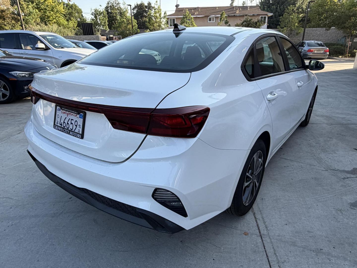 2024 White /BLACK Kia Forte LX (3KPF24AD2RE) with an 2.0L L4 DOHC 16V engine, CVT transmission, located at 30 S. Berkeley Avenue, Pasadena, CA, 91107, (626) 248-7567, 34.145447, -118.109398 - Crown City Motors is a used “Buy Here Pay Here” car dealer in Pasadena CA. “Buy Here Pay Here” financing, means that when you purchase your vehicle from our dealership, that you make the payments to the dealership as well. We do not need the banks approval to get you approved for a used auto - Photo#4