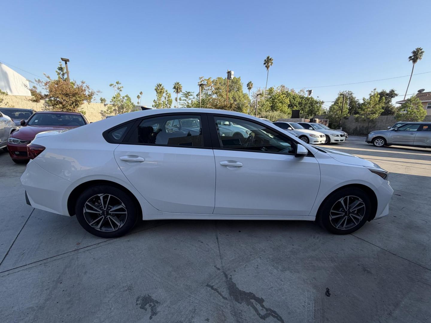 2024 White /BLACK Kia Forte LX (3KPF24AD2RE) with an 2.0L L4 DOHC 16V engine, CVT transmission, located at 30 S. Berkeley Avenue, Pasadena, CA, 91107, (626) 248-7567, 34.145447, -118.109398 - Crown City Motors is a used “Buy Here Pay Here” car dealer in Pasadena CA. “Buy Here Pay Here” financing, means that when you purchase your vehicle from our dealership, that you make the payments to the dealership as well. We do not need the banks approval to get you approved for a used auto - Photo#7