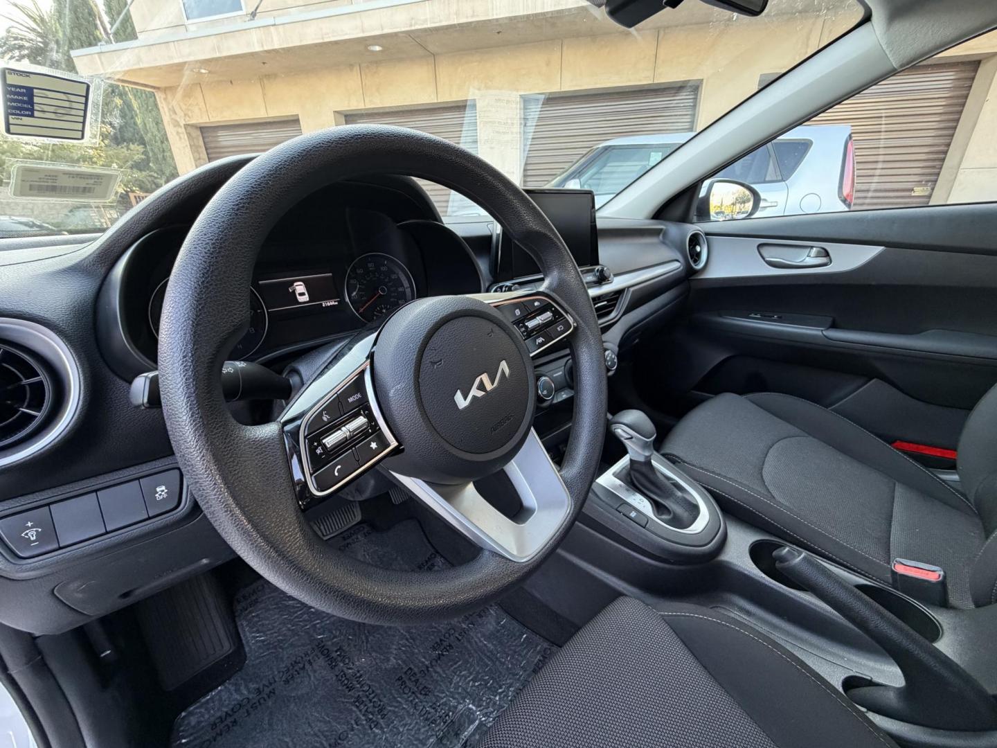 2024 White /BLACK Kia Forte LX (3KPF24AD2RE) with an 2.0L L4 DOHC 16V engine, CVT transmission, located at 30 S. Berkeley Avenue, Pasadena, CA, 91107, (626) 248-7567, 34.145447, -118.109398 - Crown City Motors is a used “Buy Here Pay Here” car dealer in Pasadena CA. “Buy Here Pay Here” financing, means that when you purchase your vehicle from our dealership, that you make the payments to the dealership as well. We do not need the banks approval to get you approved for a used auto - Photo#8