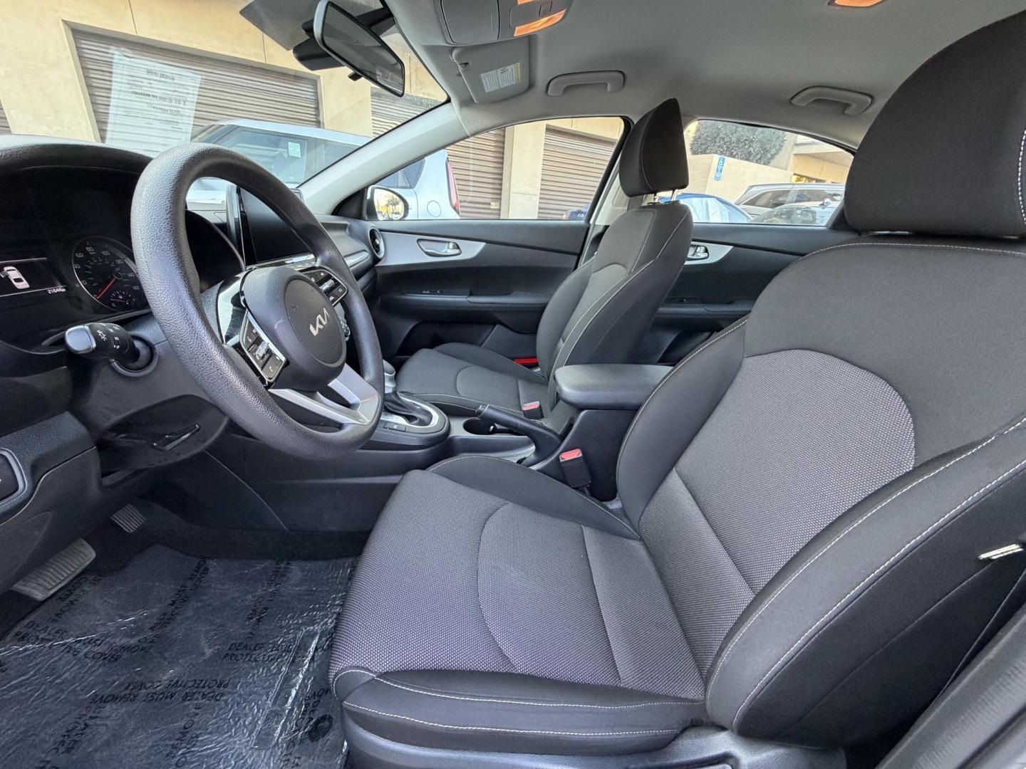 2024 White /BLACK Kia Forte LX (3KPF24AD2RE) with an 2.0L L4 DOHC 16V engine, CVT transmission, located at 30 S. Berkeley Avenue, Pasadena, CA, 91107, (626) 248-7567, 34.145447, -118.109398 - Crown City Motors is a used “Buy Here Pay Here” car dealer in Pasadena CA. “Buy Here Pay Here” financing, means that when you purchase your vehicle from our dealership, that you make the payments to the dealership as well. We do not need the banks approval to get you approved for a used auto - Photo#9