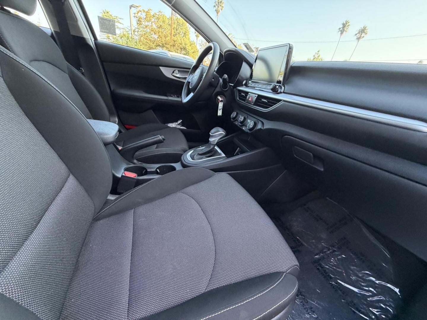 2024 White /BLACK Kia Forte LX (3KPF24AD2RE) with an 2.0L L4 DOHC 16V engine, CVT transmission, located at 30 S. Berkeley Avenue, Pasadena, CA, 91107, (626) 248-7567, 34.145447, -118.109398 - Crown City Motors is a used “Buy Here Pay Here” car dealer in Pasadena CA. “Buy Here Pay Here” financing, means that when you purchase your vehicle from our dealership, that you make the payments to the dealership as well. We do not need the banks approval to get you approved for a used auto - Photo#14