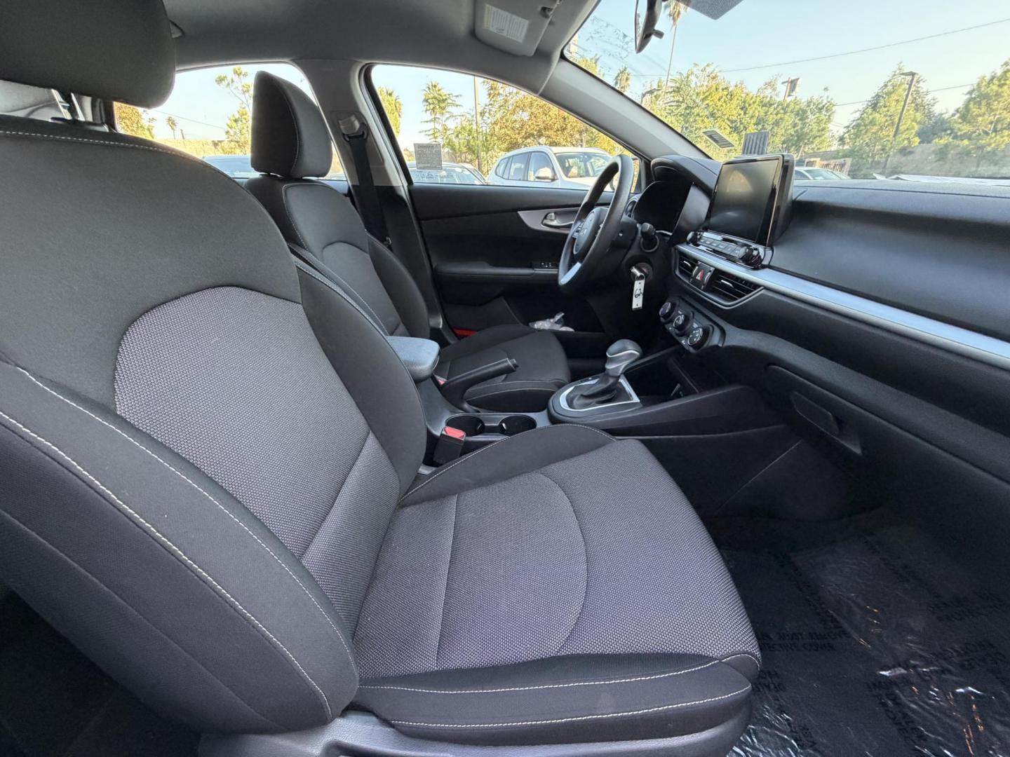 2024 White /BLACK Kia Forte LX (3KPF24AD2RE) with an 2.0L L4 DOHC 16V engine, CVT transmission, located at 30 S. Berkeley Avenue, Pasadena, CA, 91107, (626) 248-7567, 34.145447, -118.109398 - Crown City Motors is a used “Buy Here Pay Here” car dealer in Pasadena CA. “Buy Here Pay Here” financing, means that when you purchase your vehicle from our dealership, that you make the payments to the dealership as well. We do not need the banks approval to get you approved for a used auto - Photo#16