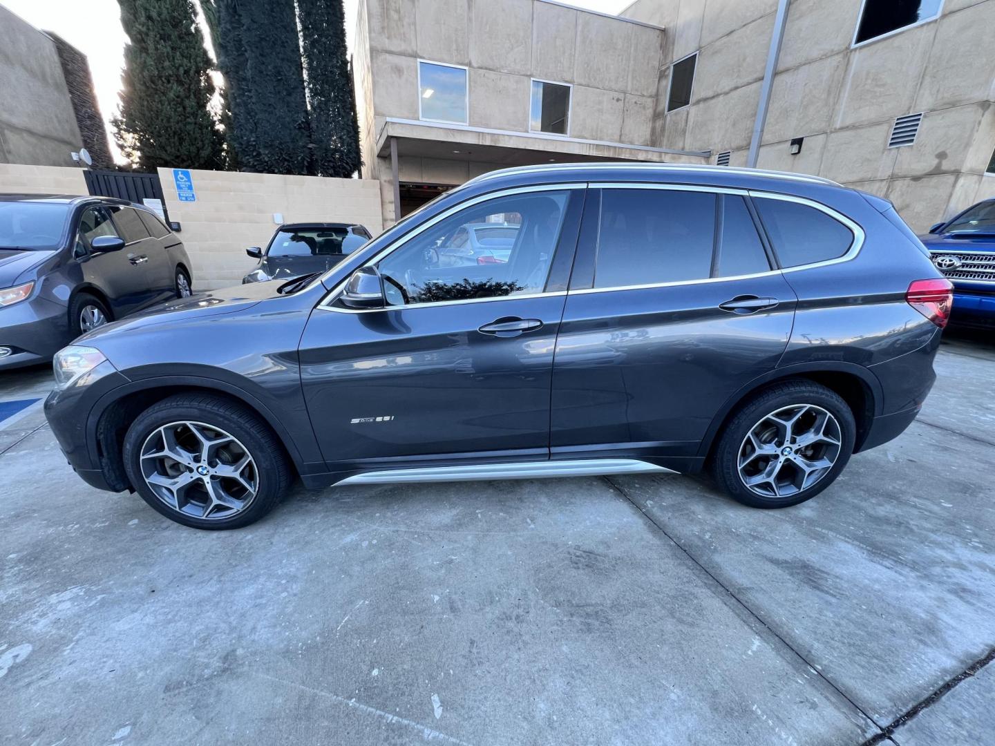 2017 BMW X1 sDrive28i (WBXHU7C36HP) with an 2.0L L4 DOHC 16V engine, 8A transmission, located at 30 S. Berkeley Avenue, Pasadena, CA, 91107, (626) 248-7567, 34.145447, -118.109398 - Photo#1